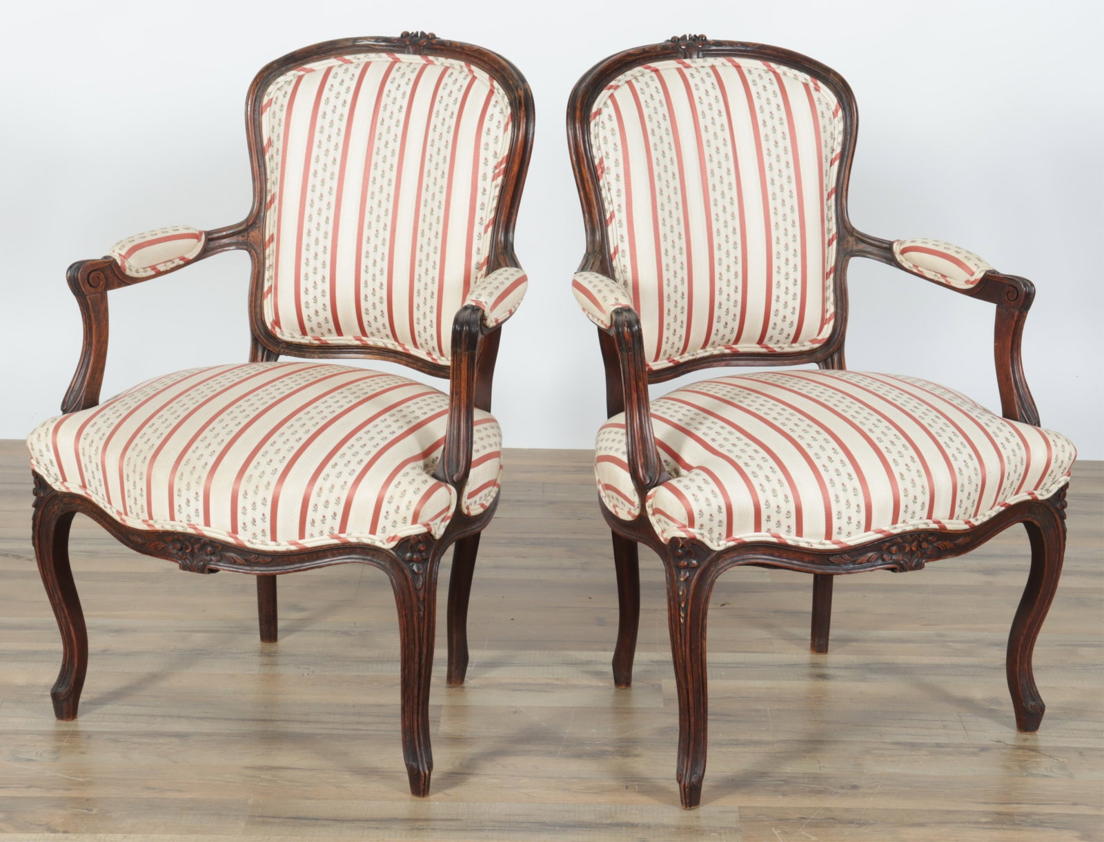 Pair of Louis XV Style Beech Fauteuils: Pair of Louis XV Style Beech Fauteuils, upholstered in cream and burgundy foliate striped fabric. 34.75" H x 23.75" W x 24" D