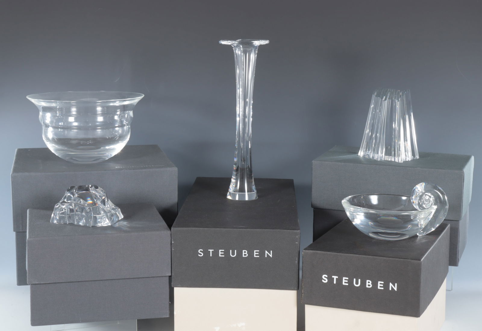 Group of Steuben Tableware: Group of Steuben Tableware. Bowls, bud vase, two paper weights. 7.75" diameter Property from the estate of Mary Bundy.