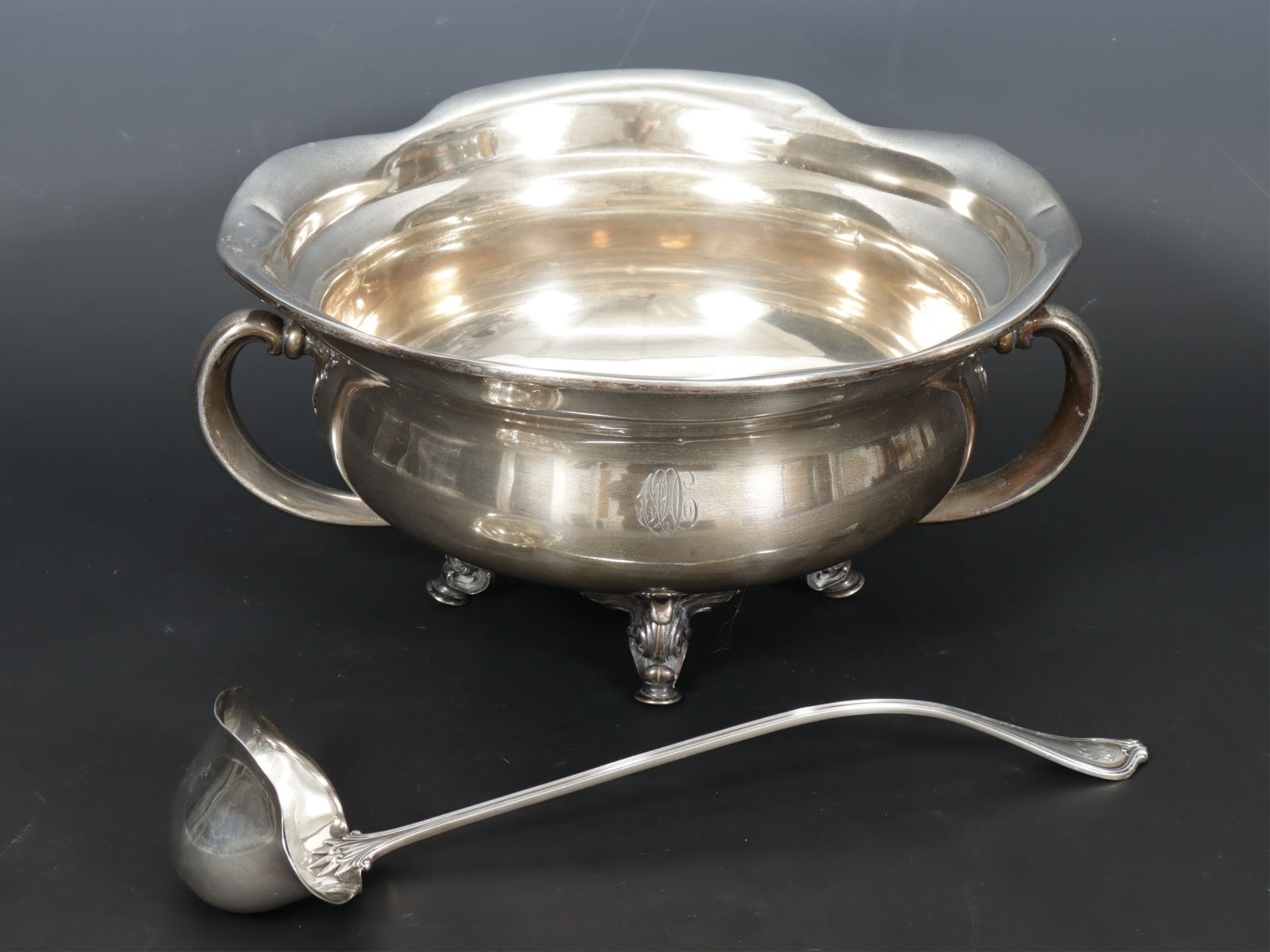 Simons Bros. Sterling Silver Punch Bowl with Ladle: Simons Brothers American sterling silver monogrammed punch bowl, 6 quart, no D3814 along with a with Towle ladle, monogram and underside date engraved "1906", total weight 56 ozt.Dimensions: 6 1/2 H x