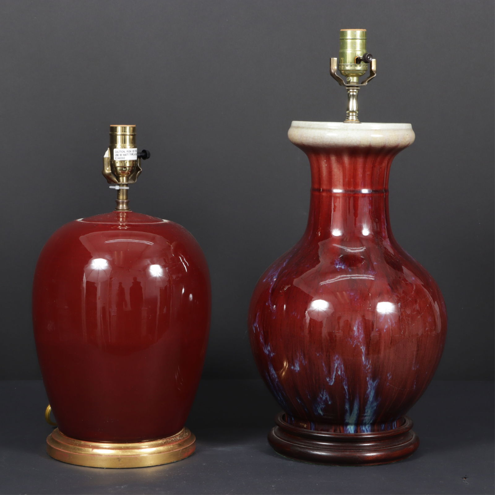 Two Chinese Oxblood Glazed Lamps: Two Chinese Oxblood Glazed LampsDimensions: Larger vase 14.75" H