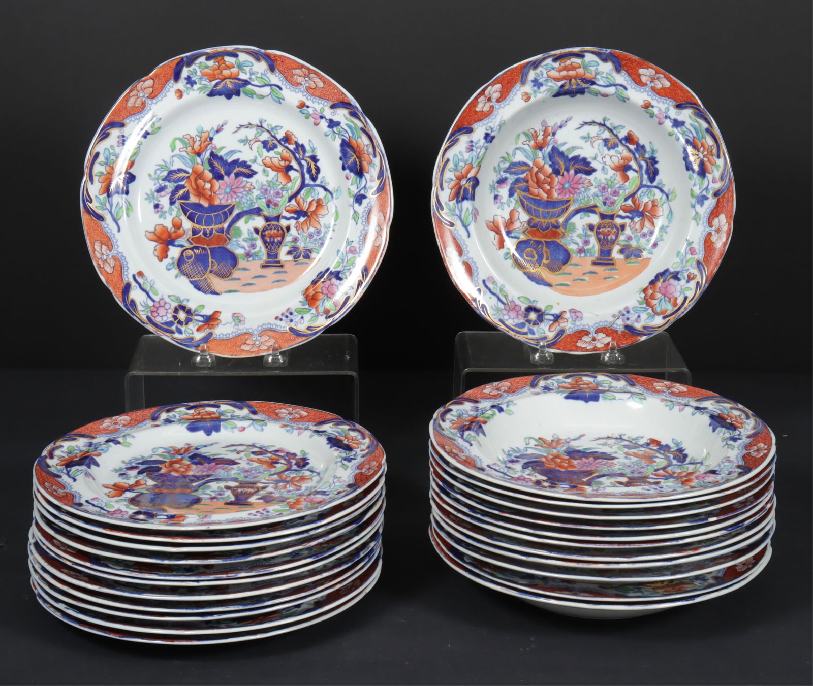 Group of Spode New Stone Porcelains: A group of Spode "New Stone" porcelain dinner plates and soups, 24 pieces in total.Dimensions: Plates 9.75" diameter. Soups 9.5" diameter.