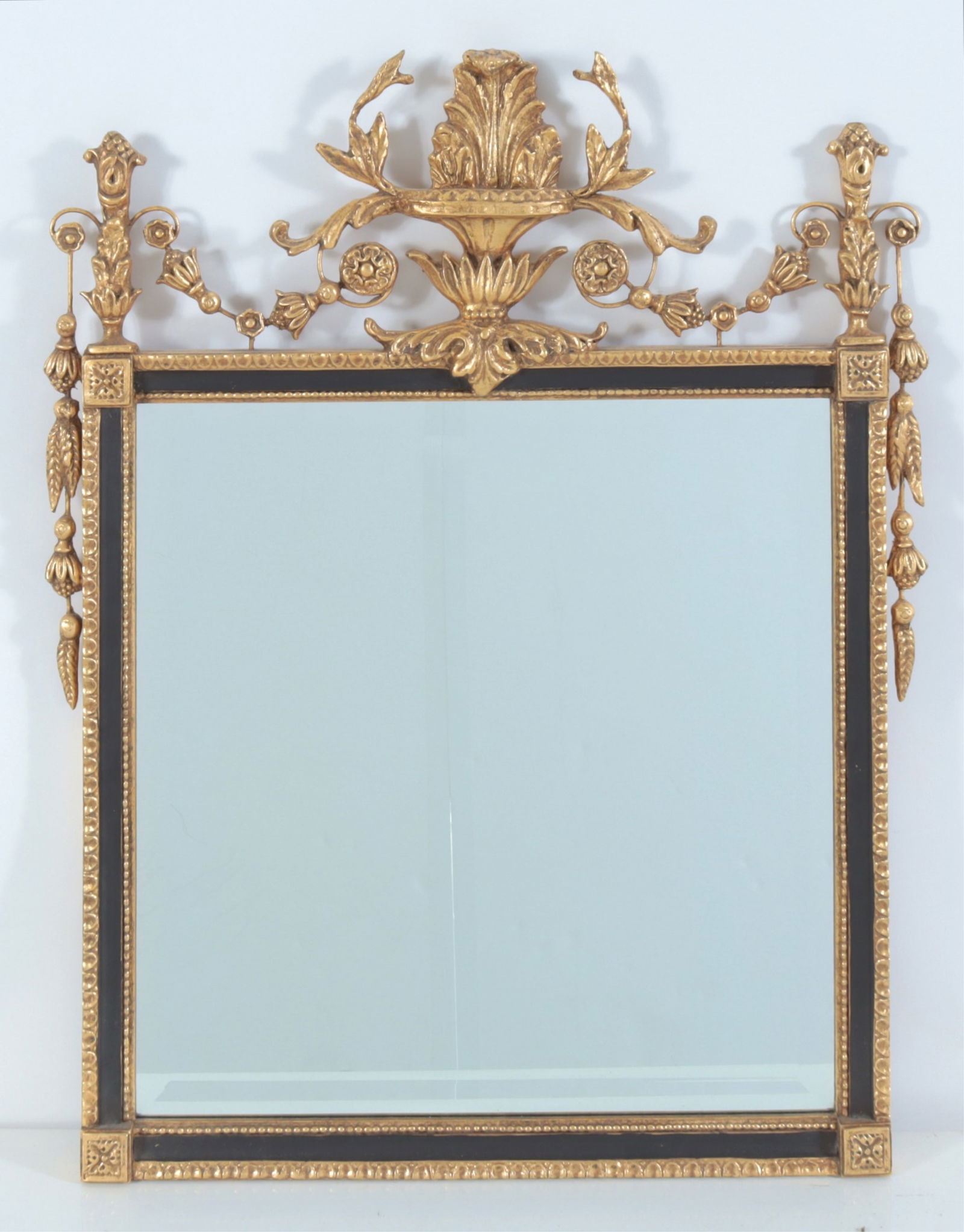 Classical Style Composition Gilt & Black Mirror: Classical Style Composition Gilt & Black Painted Mirror, with beveled plateDimensions: 30.25" H x 24.75" WProperty from the Estate of Mary C. Bailey