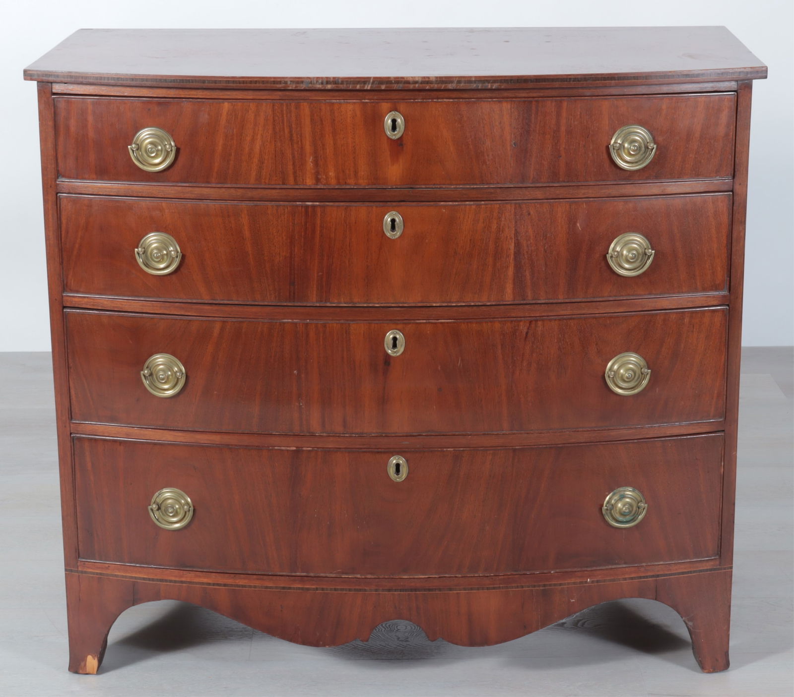 Federal Mahogany Bow Front Chest of Drawers, 19C: Federal Mahogany Bow Front Chest of Drawers, Early 19th C.Dimensions: 37.25" H x 42" W x 22" D
