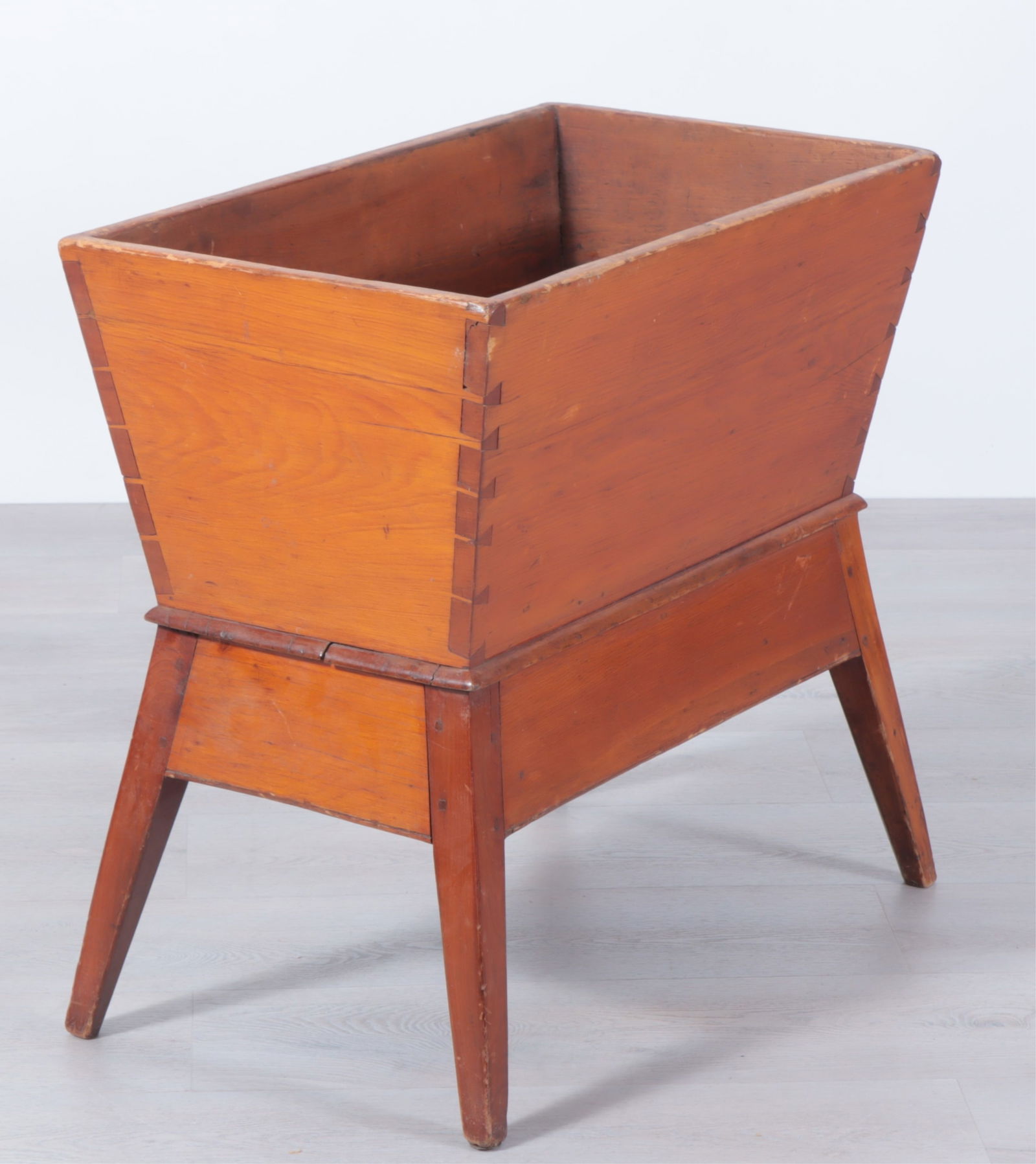 American Pine Dough Bin: American pine dough bin, 19th Century, with dovetailed sides, on a stand.Dimensions: 26 1/2" H x 28" W x 16" D