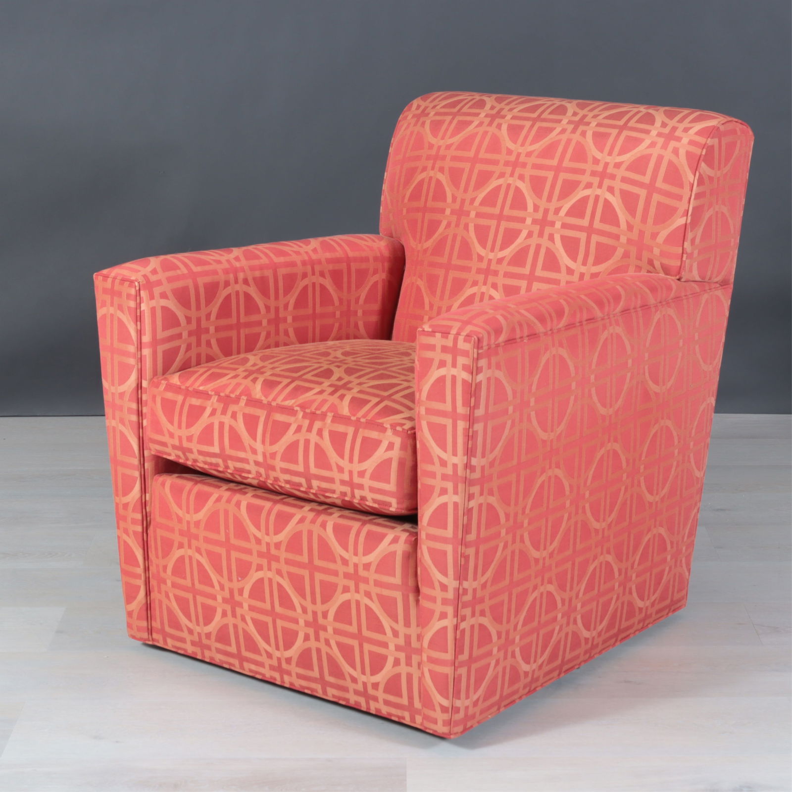 Stickley Swivel Club Chair: Stickley Upholstered Swivel Club Chair, upholstered in geometric burgundy fabricDimensions: 35" H x32" W x 35" DProperty from the Estate of Mary C. Bailey