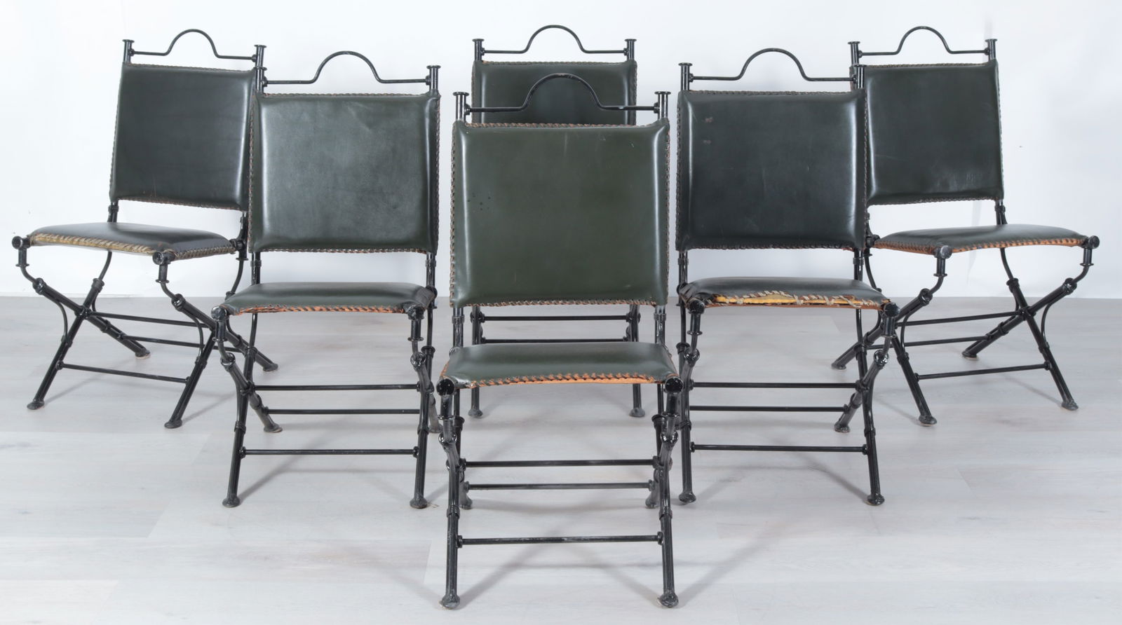 Set of 6 Ilana Goor Style Iron Side Chairs: Set of 6 Ilana Goor style black painted Iron side chairs, in green leather upholstery.Dimensions: 37.5" H x 18.5" W x 20.5" D
