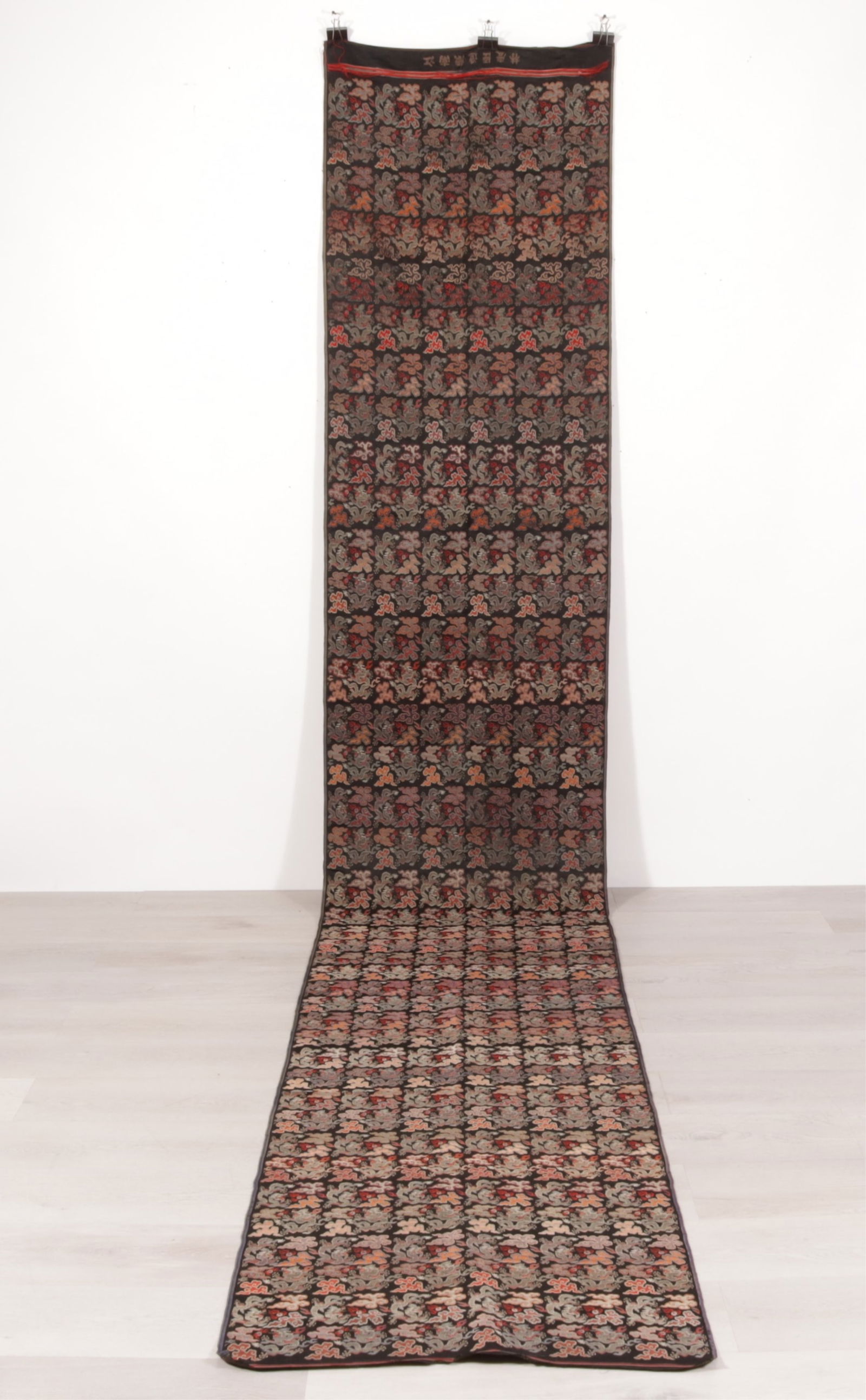 Japanese Embroidered Silk Panel: Japanese Embroidered Silk Panel, Early 20th C., black with dragons and clouds Dimensions: 171" L x 28" W