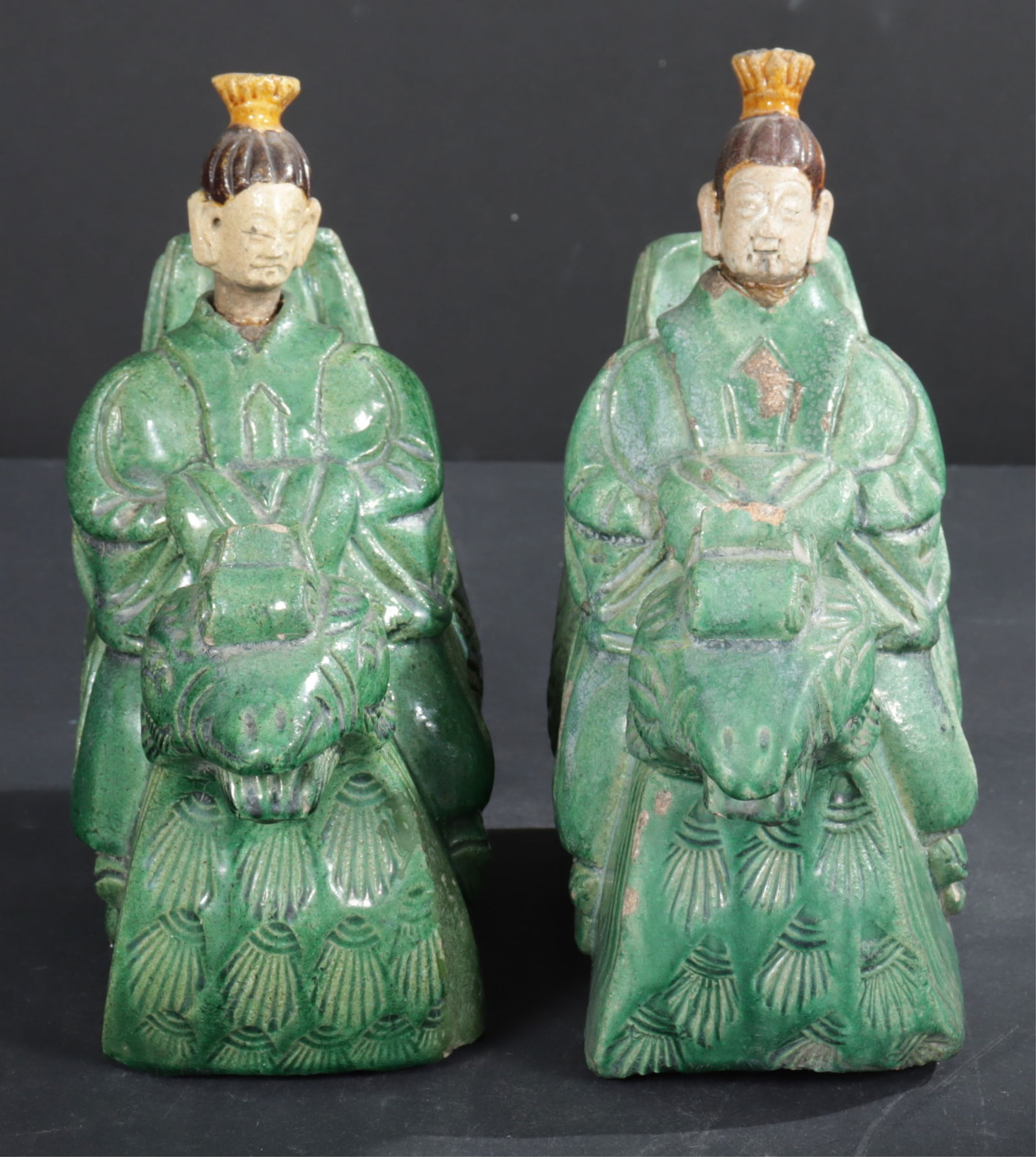 Pair of Chinese Green Glazed Ceramic Figures: Pair Chinese Green Glazed Ceramic Figures, depicting immortals riding phoenixes. Dimensions: 9" H 