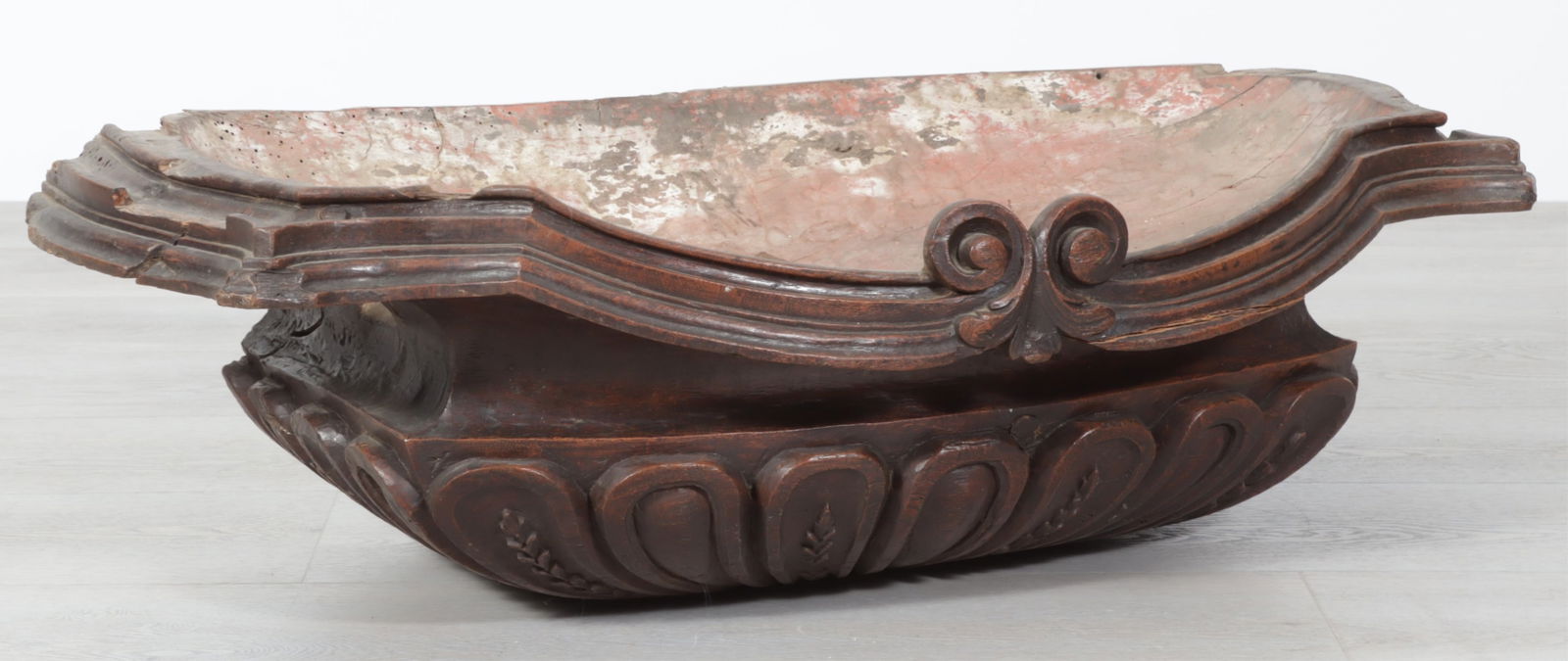 Continental Baroque Walnut Font, 18th C.: Continental Baroque Walnut Font, 18th C., gadrooned urn form base. Dimensions: 10.5" H x 39.5" W x 17" D 