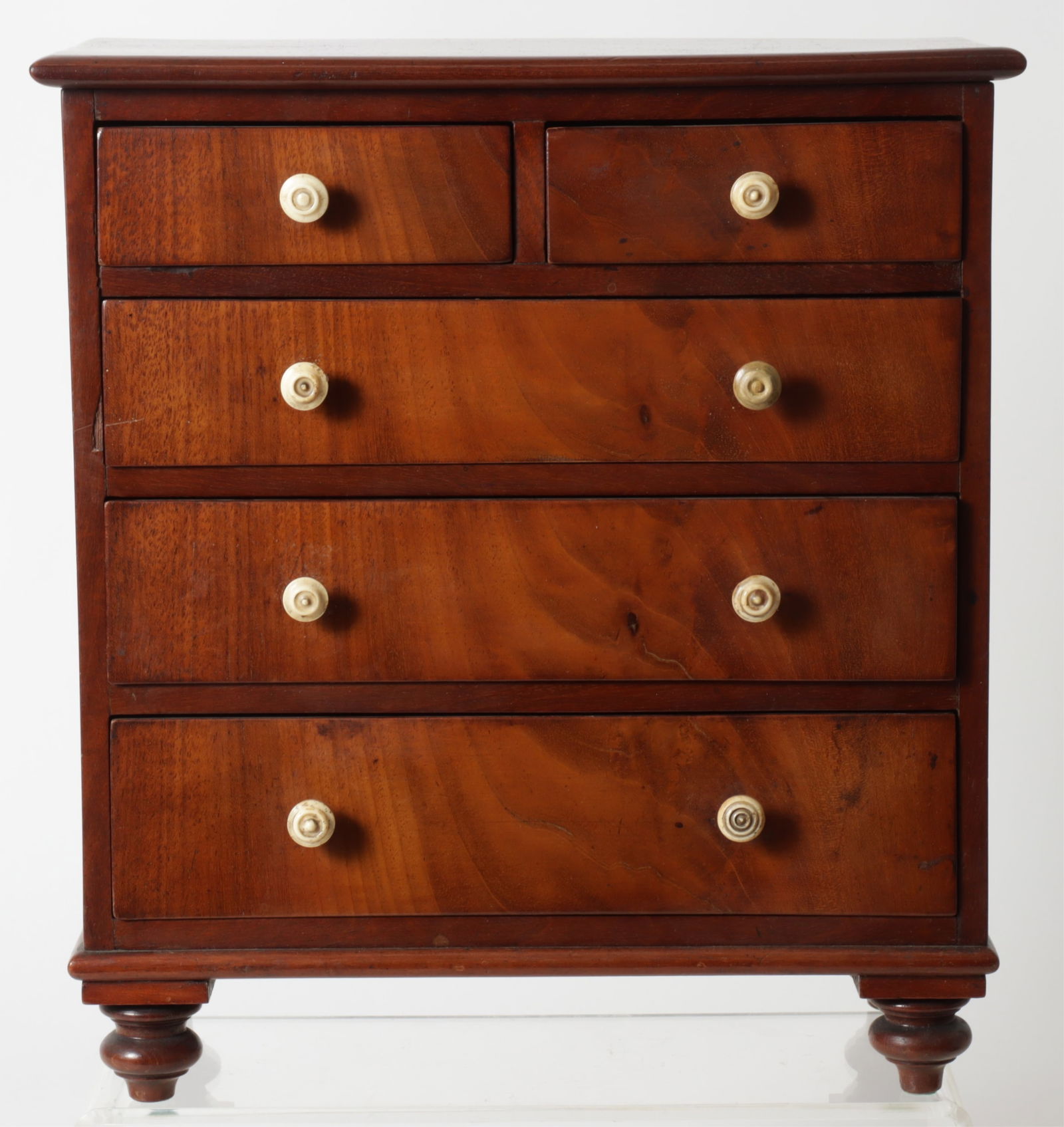 Early Victorian Miniature Chest of Drawers, 19th C: Early Victorian Mahogany Miniature Chest of Drawers, Mid 19th C. Dimensions: 11.5" H x 10.5" W x 5.25" D 