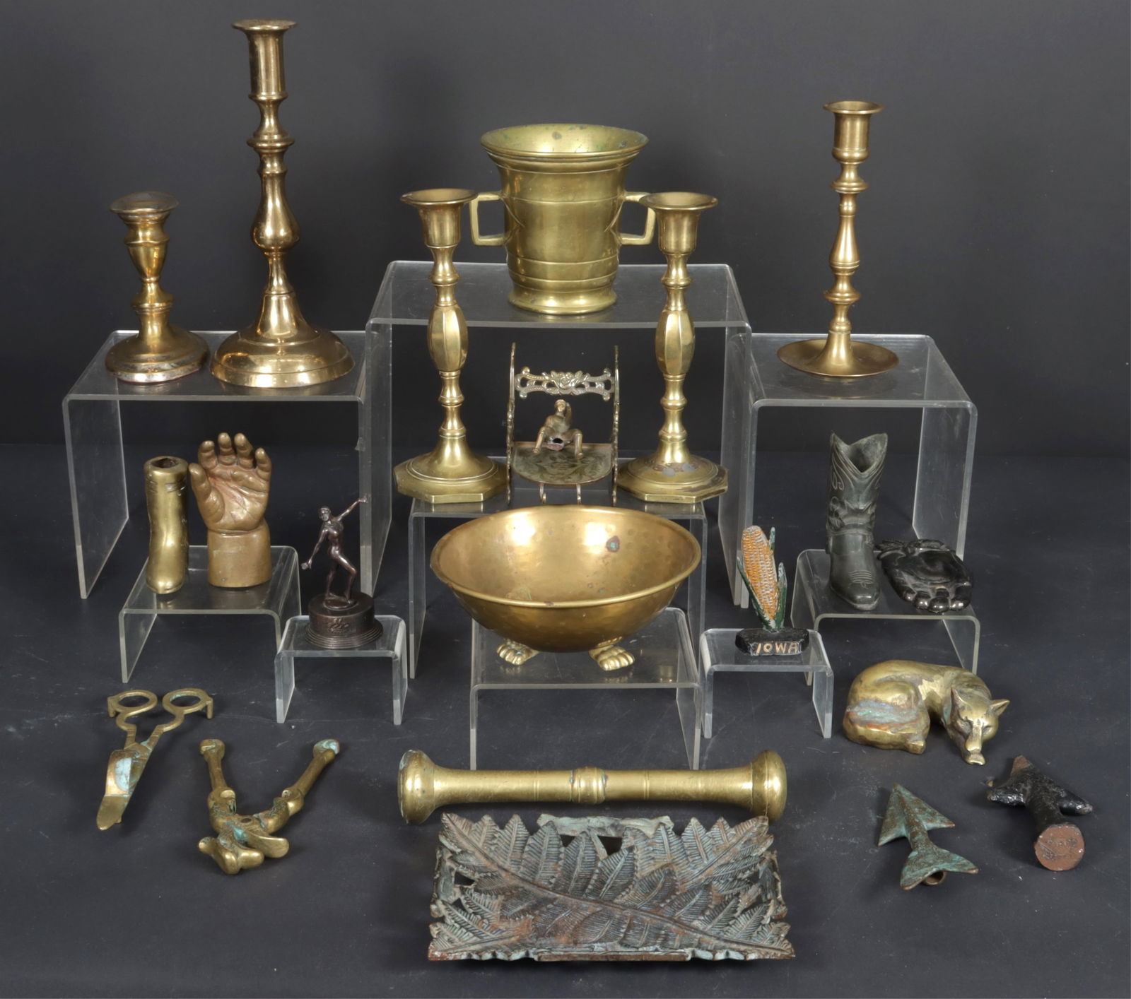 Collection of Bronze, Brass, Metal Objects: Collection of objects, including candlesticks, mortar & pestle, a hand, sleeping fox and more. Dimensions: Various from 2" H to 9.5" H
