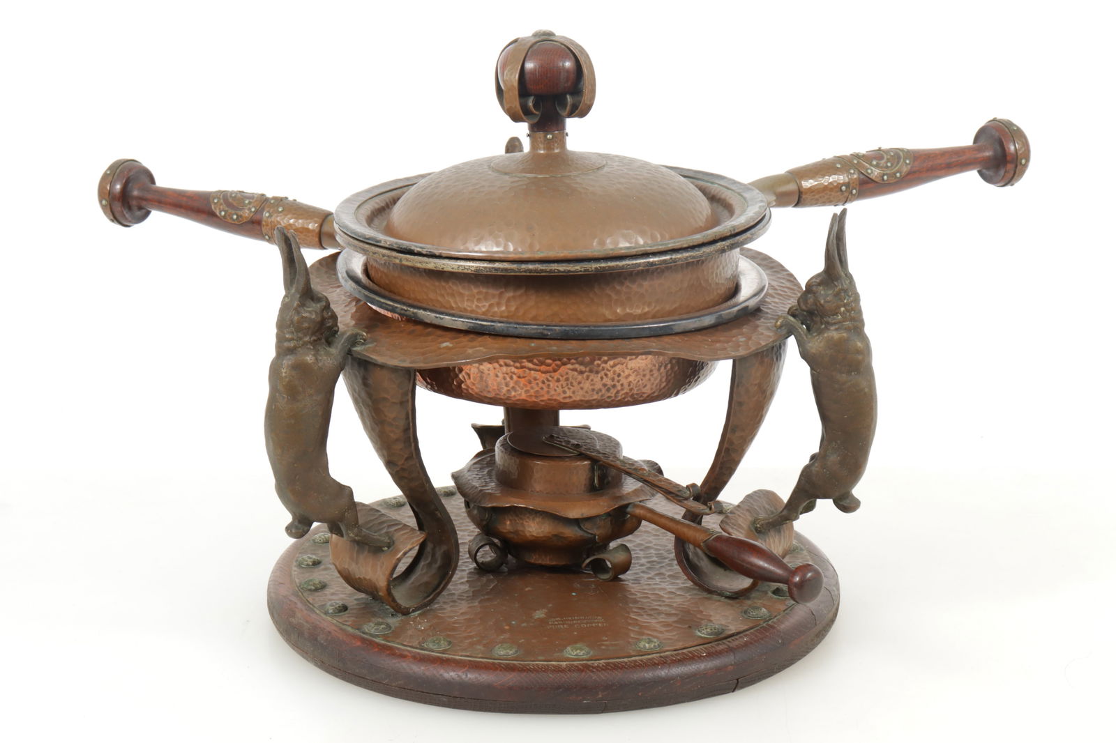 Joseph Heinrichs Copper Hare Chafing Dish: Joseph Heinrichs, German-American, 1866-1937, (Active 1898-1937) E. 20th C., Arts and Crafts hare (rabbit) chafing dish, hammered copper, brass, sterling silver with oak wood base, 3 cast hare