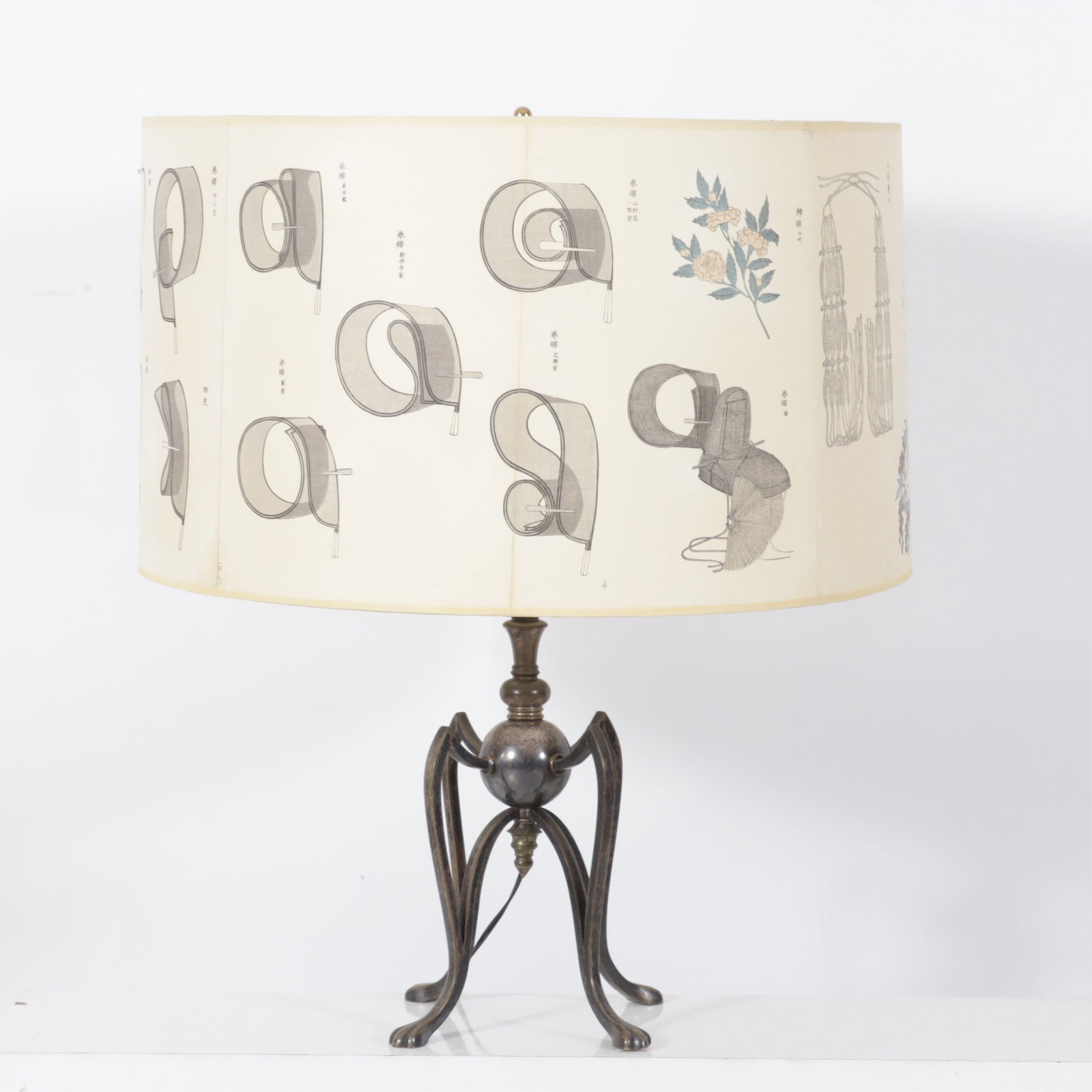 Possibly W.A.S. Benson Table Lamp: English silvered brass 4 leg trifid foot table lamp with Japanese theme printed shade, possibly W.A.S. (William Arthur Smith) Benson Dimensions: 29 1/2 H x 8 1/2 W, Shade 14 1/2 x 24 From a