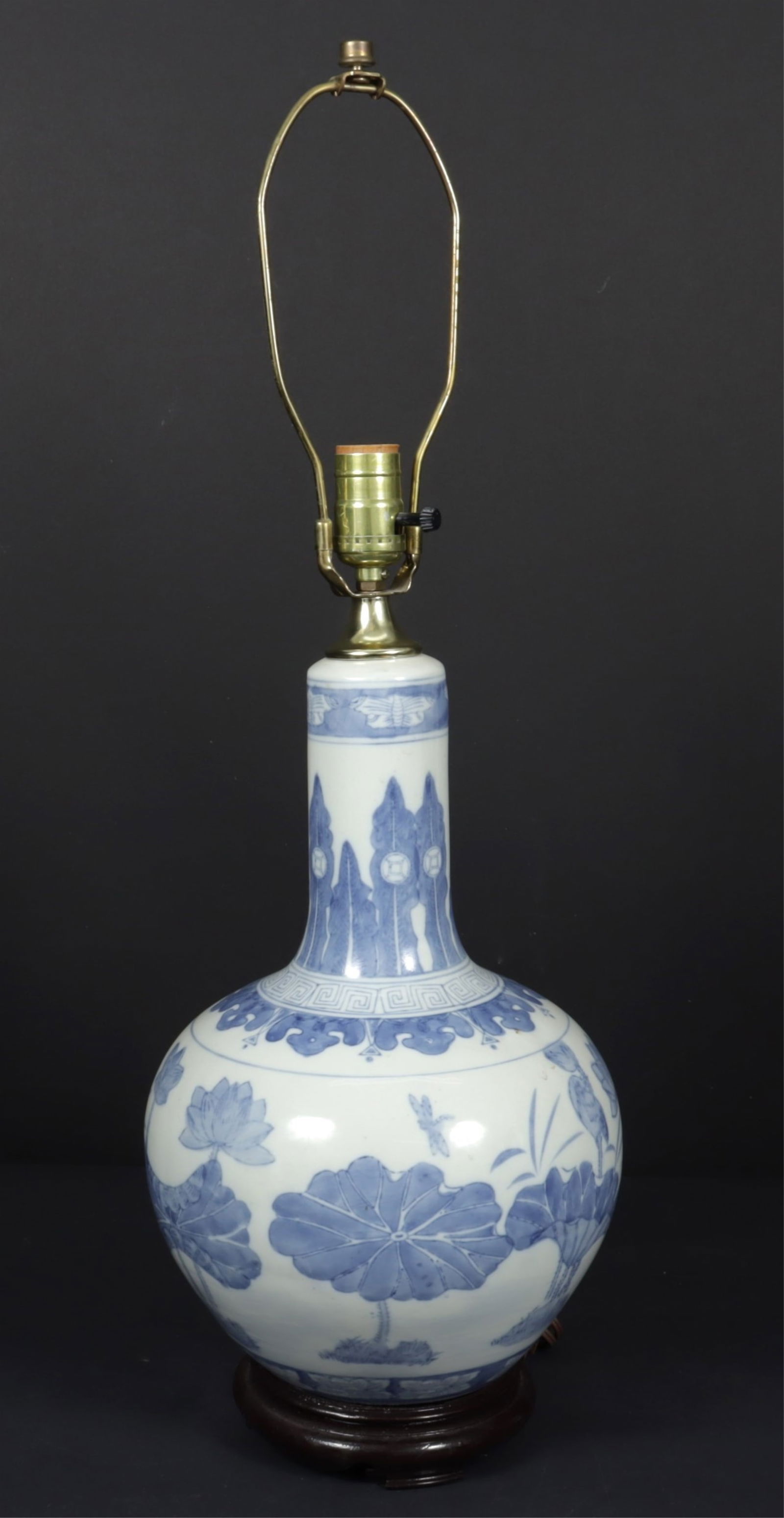 Chinese Style Blue & White Porcelain Lamp: Chinese Style Blue & White Porcelain Lamp, marked Made in China on underside Dimensions: To the finial 27.5" H 