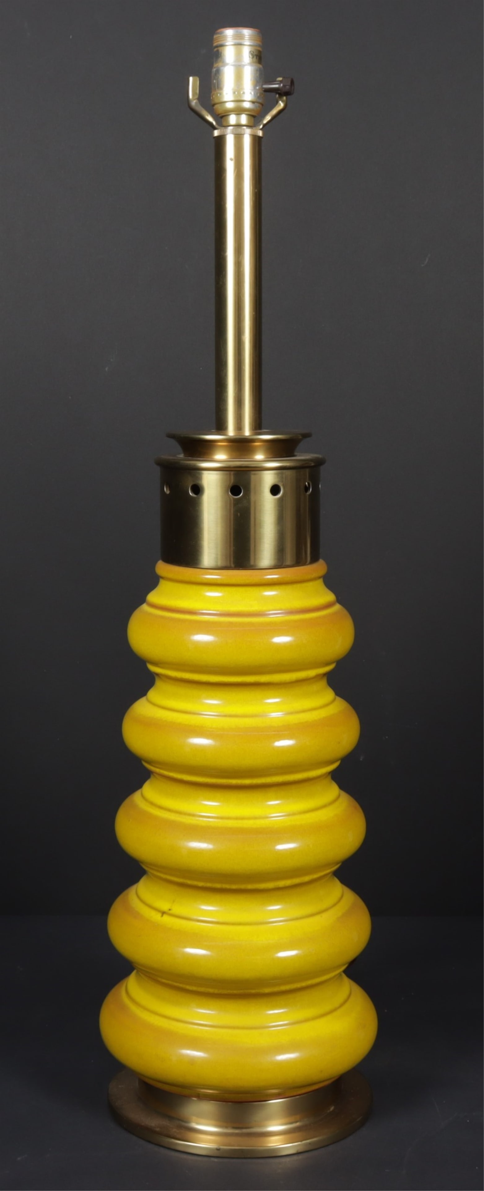 Stiffel Mid-Century Bubble Ceramic Table Lamp: Mid-century modern mustard yellow glazed ceramic table lamp of stacked bubble form with brass top by Stiffel. Labeled on fixture. Dimensions: To the fixture 26.5" H 