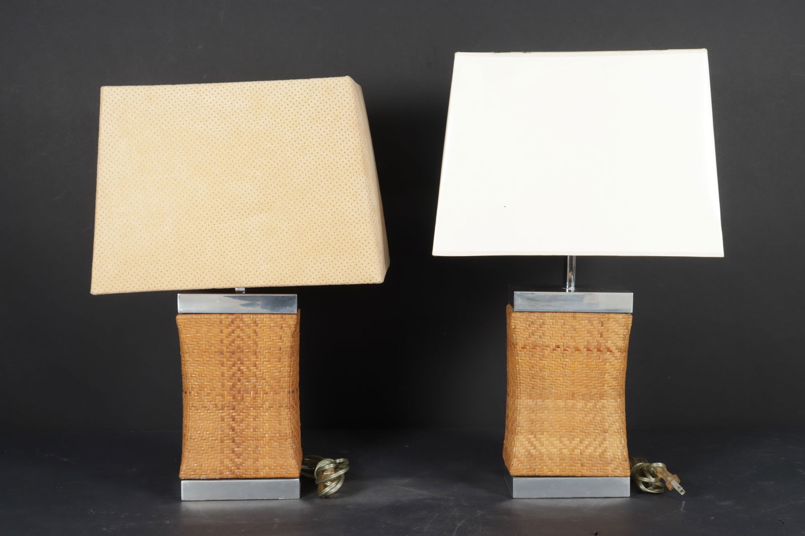 Pair Alessandro Albrizzi Chinese Pillow Table Lamp: Pair of Alessandro Albrizzi Chinese pillow table lamps, London, c. 1967-1972, aluminum and rattan, shade frame by Artemis Studios, London, one shade covered in perforated suede material. Provenance: