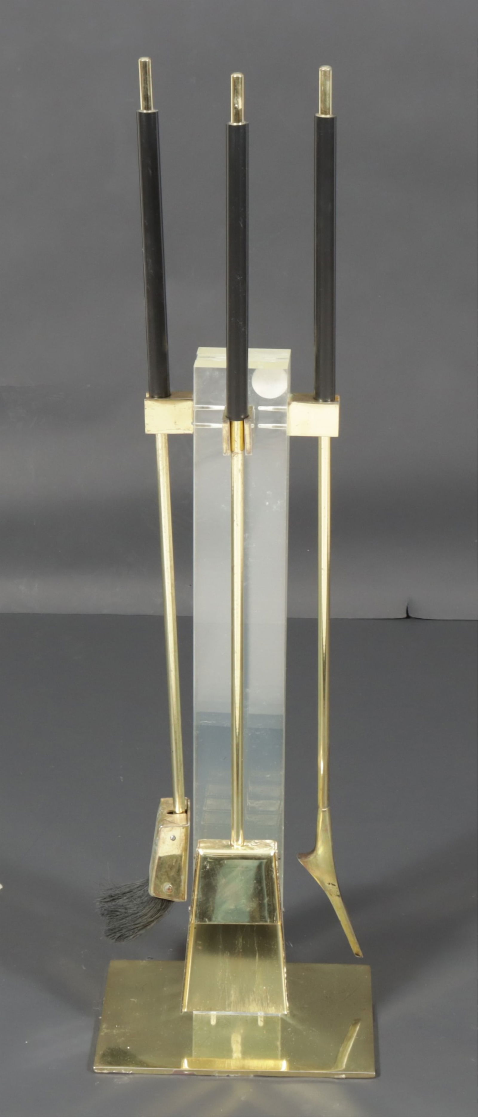 Alessandro Albrizzi - Fire Tool Set: Alessandro Albrizzi, Italian, 1934-1994, Italy, set of 4 piece fire tools and stand, c. 1960, lucite, brass plated metal and plastic Dimensions: 35" H x 10"W x 8 1/2 D Property of a New York