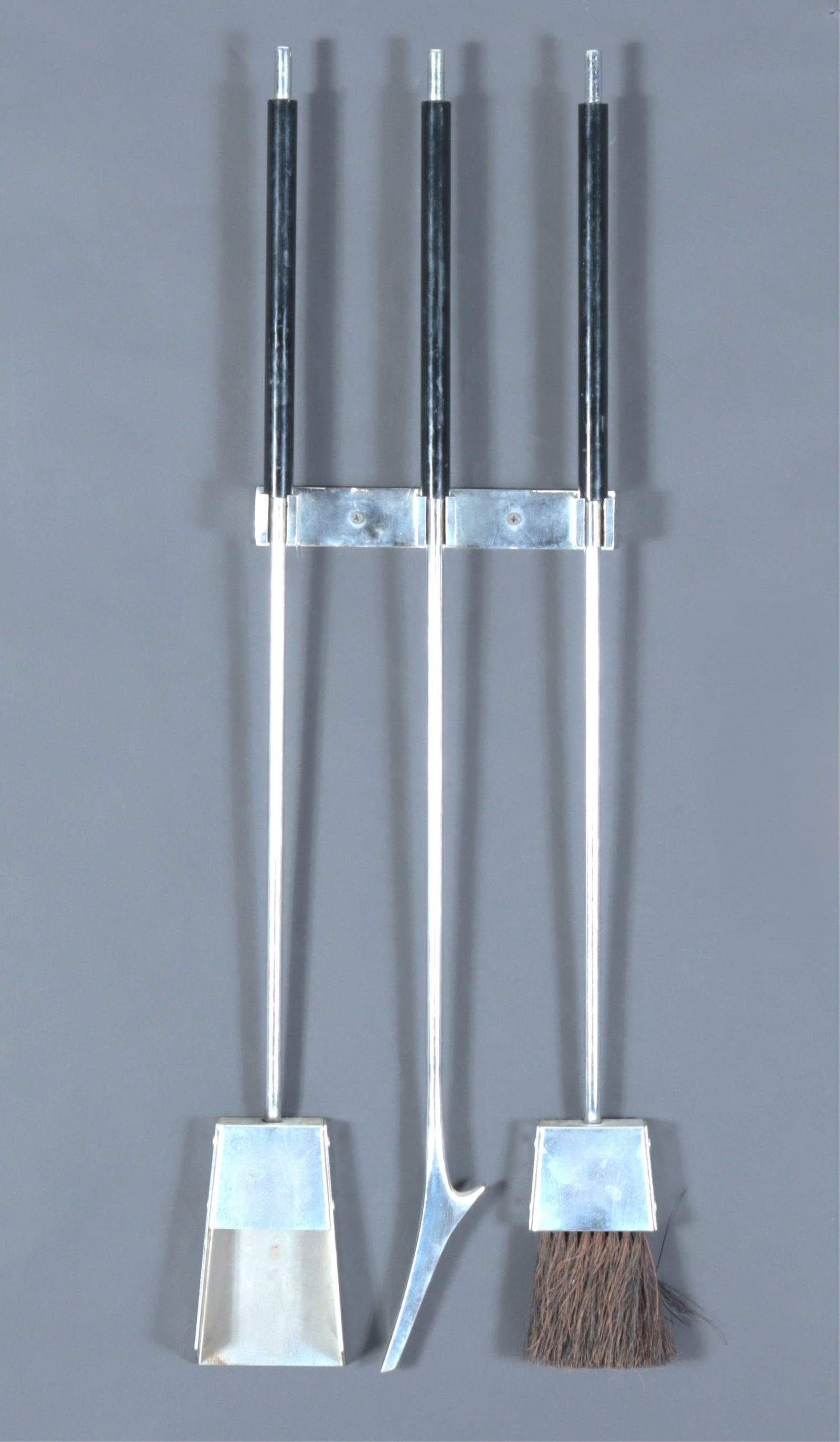 Alessandro Albrizzi Fire Tool Set: Alessandro Albrizzi, Italian, 1934-1994, Italian chrome & Lucite fireplace tool set, comprising broom, poker and shovel, with wall-mount Dimensions: Tools about 33" L; mount: 1-5/8" H x 9 1/4" W x 2"