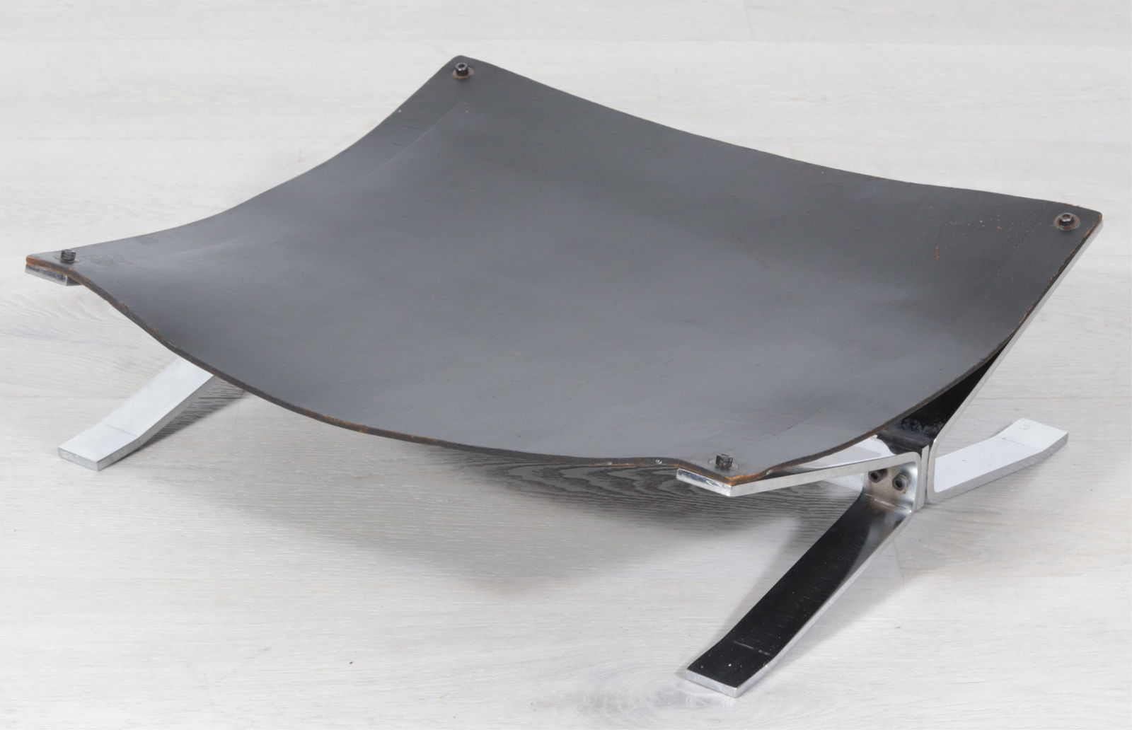 Alessandro Albrizzi Log Holder, c,1970: Alessandro Albrizzi, Italian, 1934-1994, Log Holder, chrome plated steel and leather, c. 1970 Dimensions: 5"H x 18"W x 16 1/2"D Property of a New York Architect and Designer