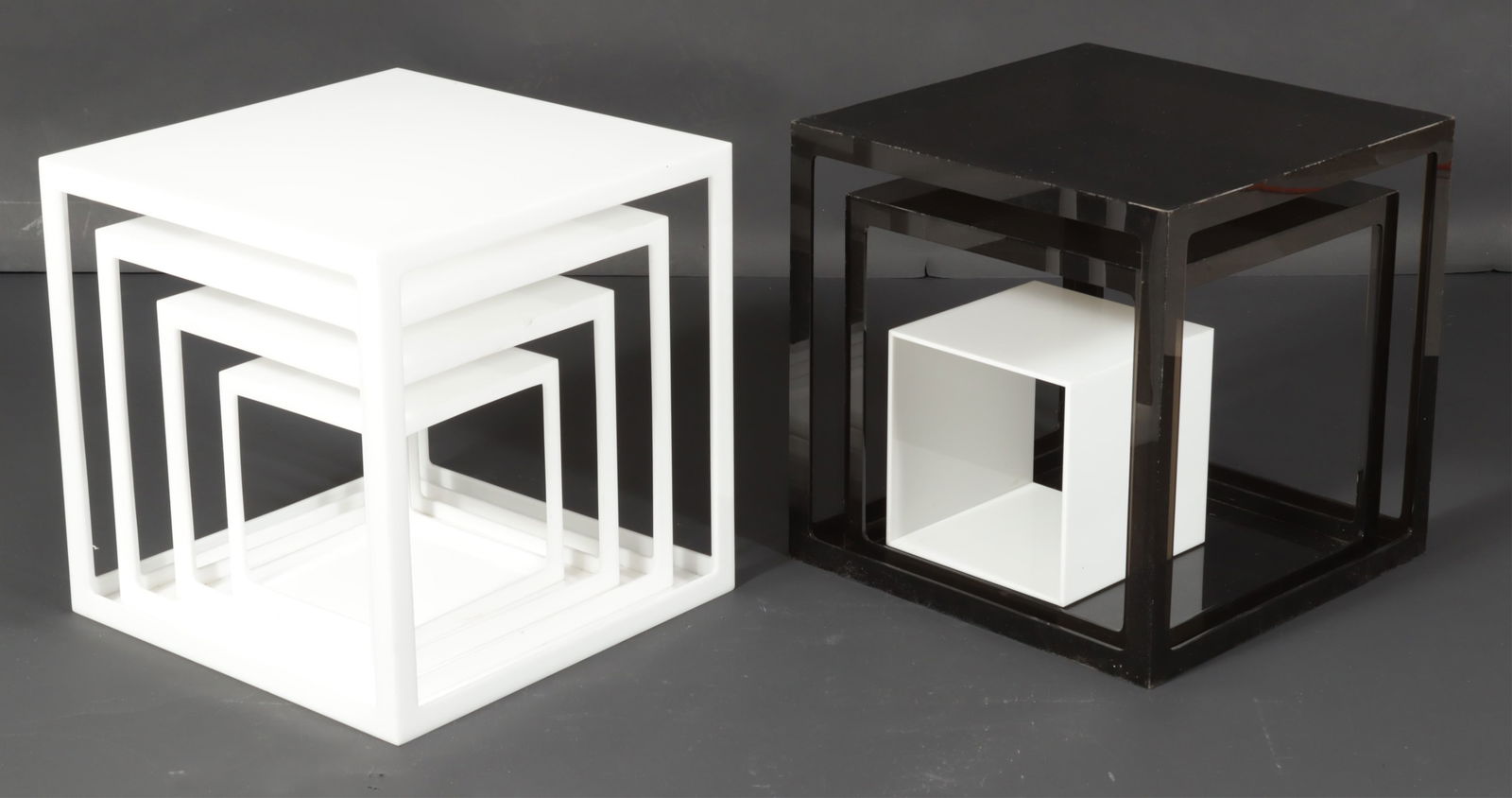 Alessandro Albrizzi Nesting Tables and Cube: Alessandro Albrizzi, Italian, 1934-1994, set of 4 white acrylic nesting tables, two black open cubes, along with one solid white cube/stand stacking etagere, some pieces label to underside Albrizzi -