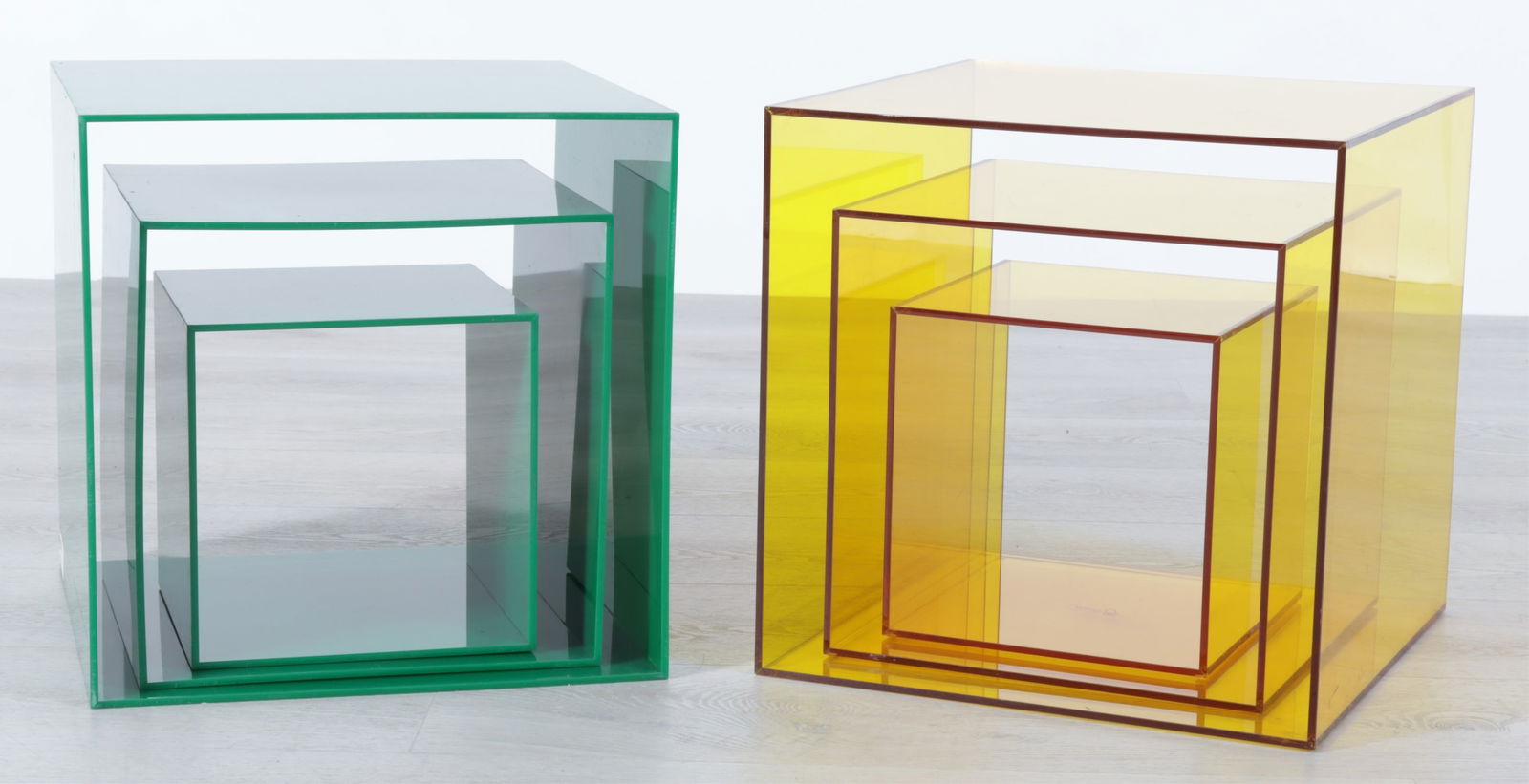Alessandro Albrizzi - 2 Cube Nesting Tables: Alessandro Albrizzi, Italian, 1934-1994, two sets of acrylic cube nesting tables in green and yellow colors Dimensions: 15 x 15 x 15 and 9 x 9 x 9 Property of a New York Architect and Designer