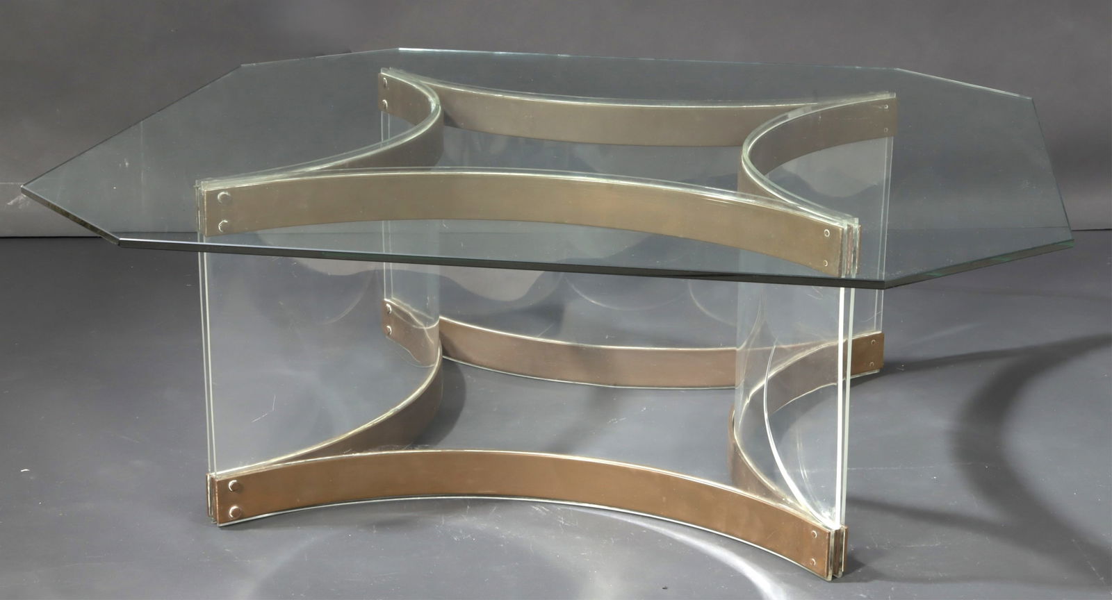 Alessandro Albrizzi Cocktail Table: Alessandro Albrizzi, Italian, 1934-1994, Cocktail Table, bronze and plexi glass, glass top c. 1967-72. Dimensions: Base 15 1/4"H x 27 1/2"square , glass 42" x 1/2" Property of Baron Alessandro Rubin d