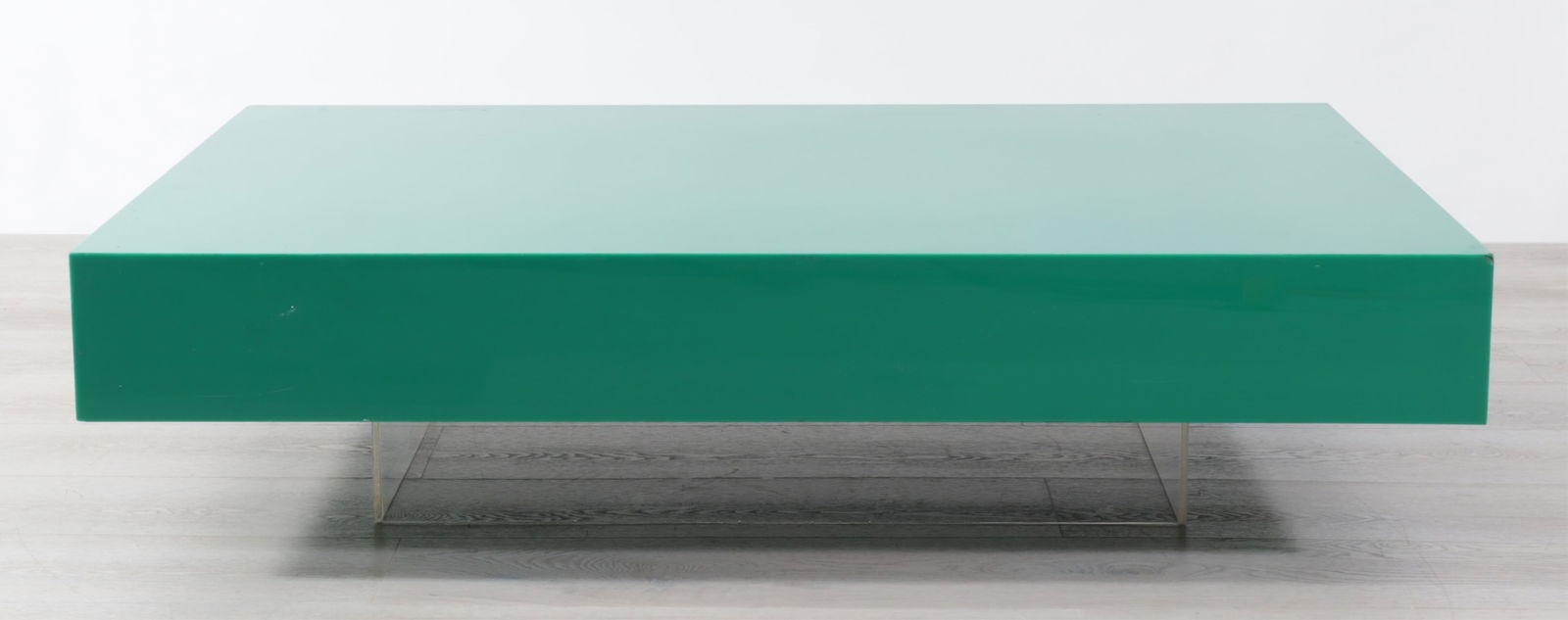 Alessandro Albrizzi Green Cube Coffee Table: Alessandro Albrizzi, Italian, 1934-1994, green and clear lucite coffee/drinks table, label to underside, Albrizzi Made in England, c. 1967-1972. Dimensions: 48"W x 36"D x 12"H Property of Baron Alessa