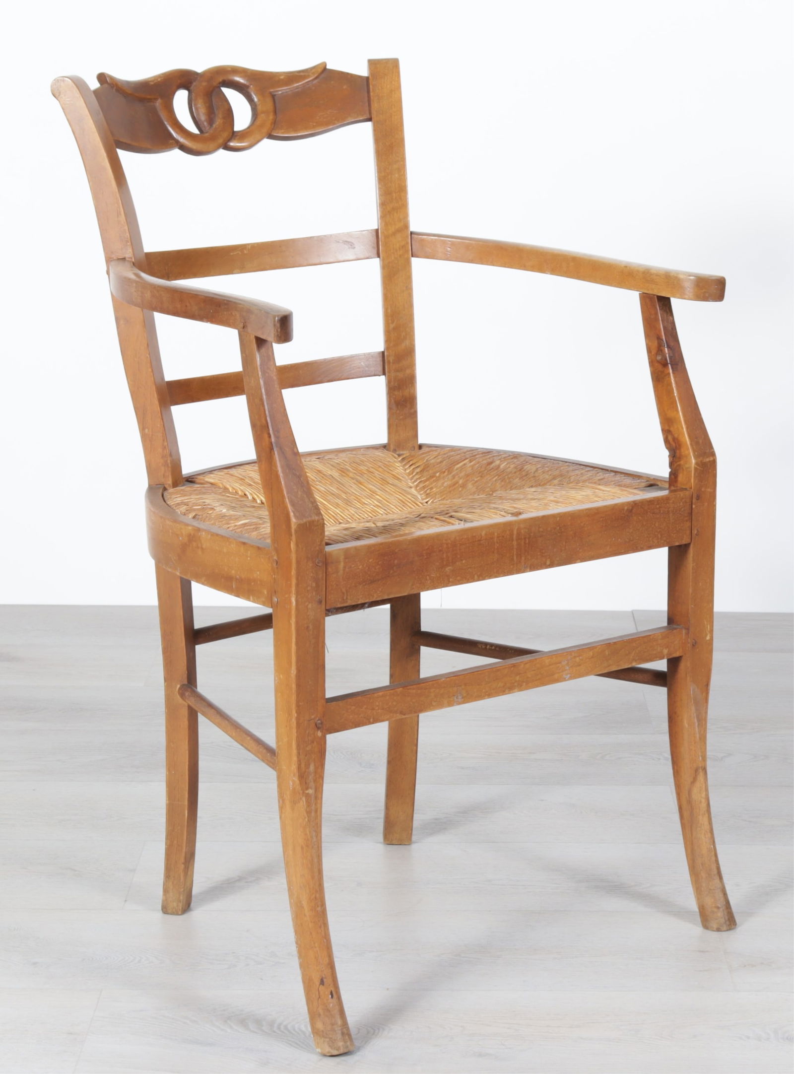 French Provincial Cherry Armchair: French Provincial Cherry Armchair with rush seat Dimensions: 34" H x 22" W x 22" D 