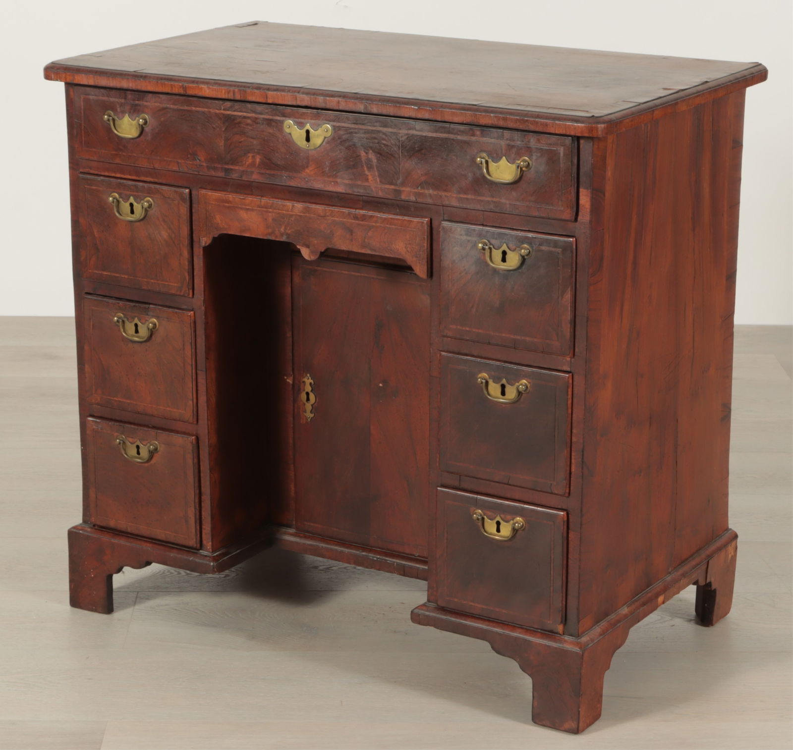 George II Inlaid Walnut Dressing Table, 19th C.: George II Inlaid Walnut Dressing Table, 19th C. Frieze drawer over two pedestals of three drawers, centered by apron drawer, inset feet. Dimensions: 30" H x 32.25" W x 19.25" D