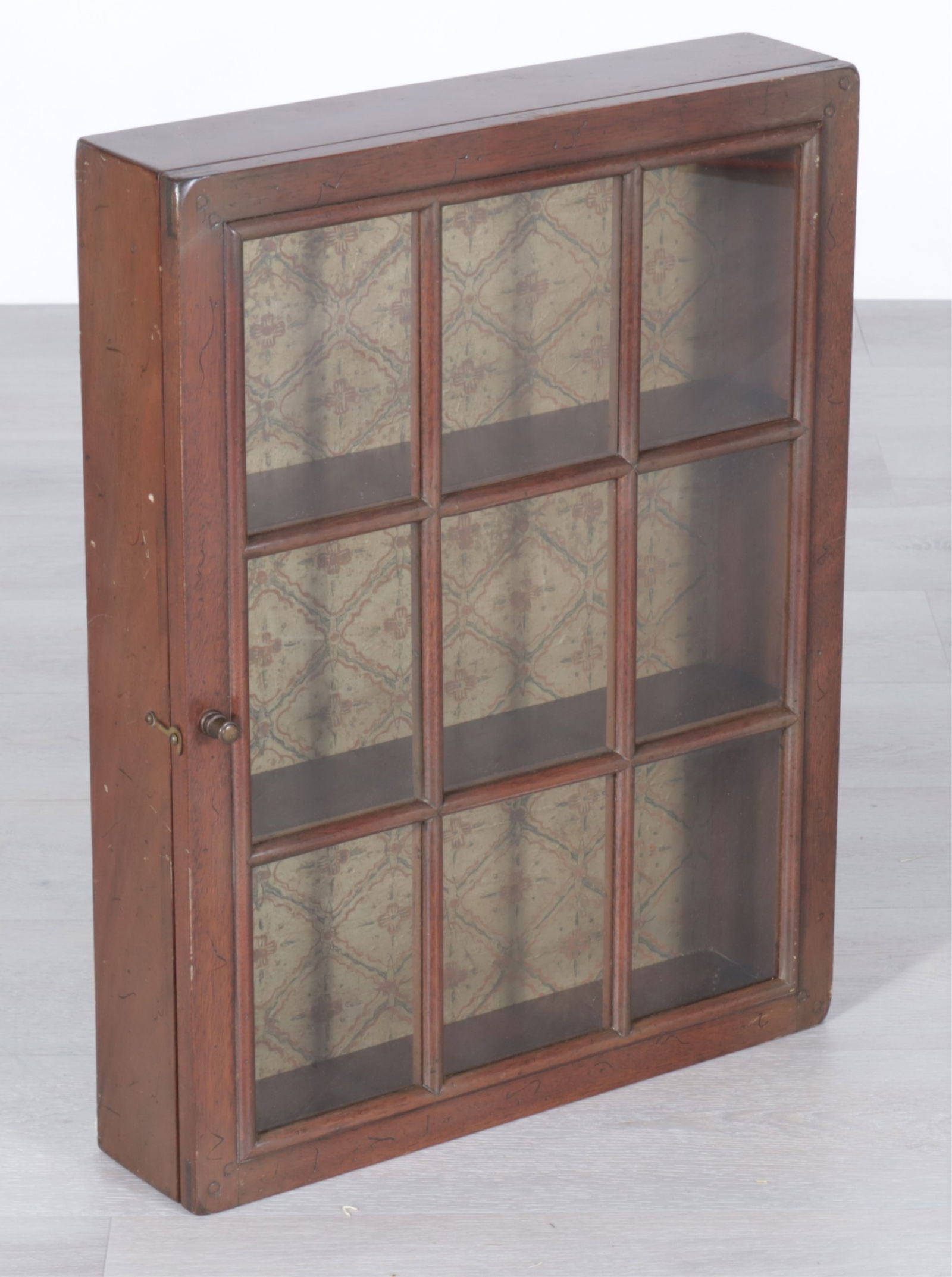 George III Style Mahogany Display Cabinet: George III Style Mahogany Display Cabinet, possibly Don Rousseau. Paper lined interior. Dimensions: 25" H x 19" W x 4.5" D 