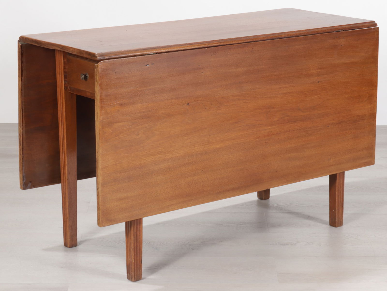 Chippendale Walnut Dropleaf Table, 18th C.: Chippendale Walnut Dropleaf Table, 18th C., possibly American, rectangular top with tapered square legs. Dimensions: 27" H x 17.75" W x 43" D 