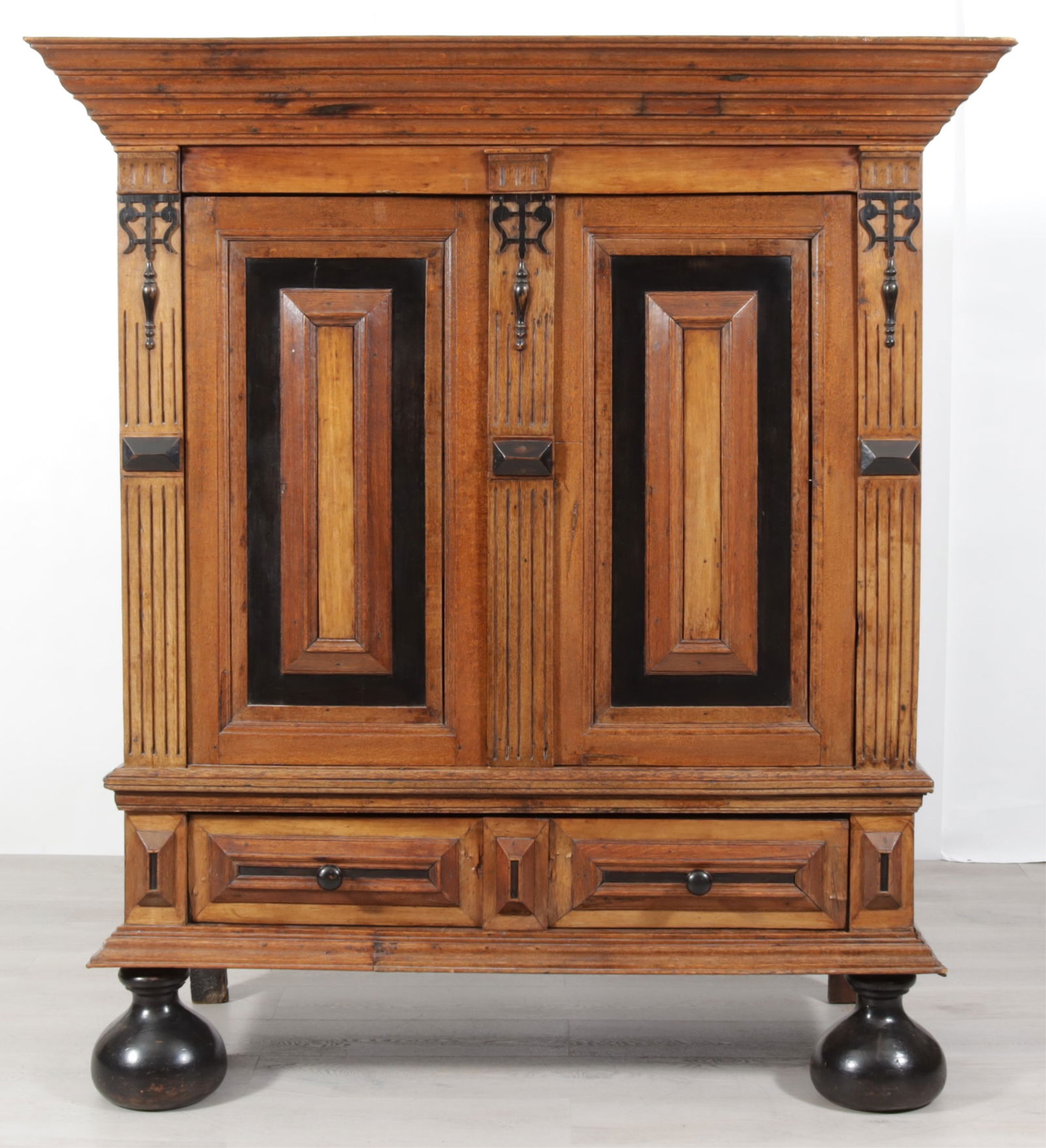 Dutch Baroque Revival Parcel-Ebonized Oak Kas, 19C: Dutch Baroque Revival Parcel-Ebonized Oak Kas, 19th C., composed of antique elements Dimensions: 76.25" H x 68.75" W x 29" D 