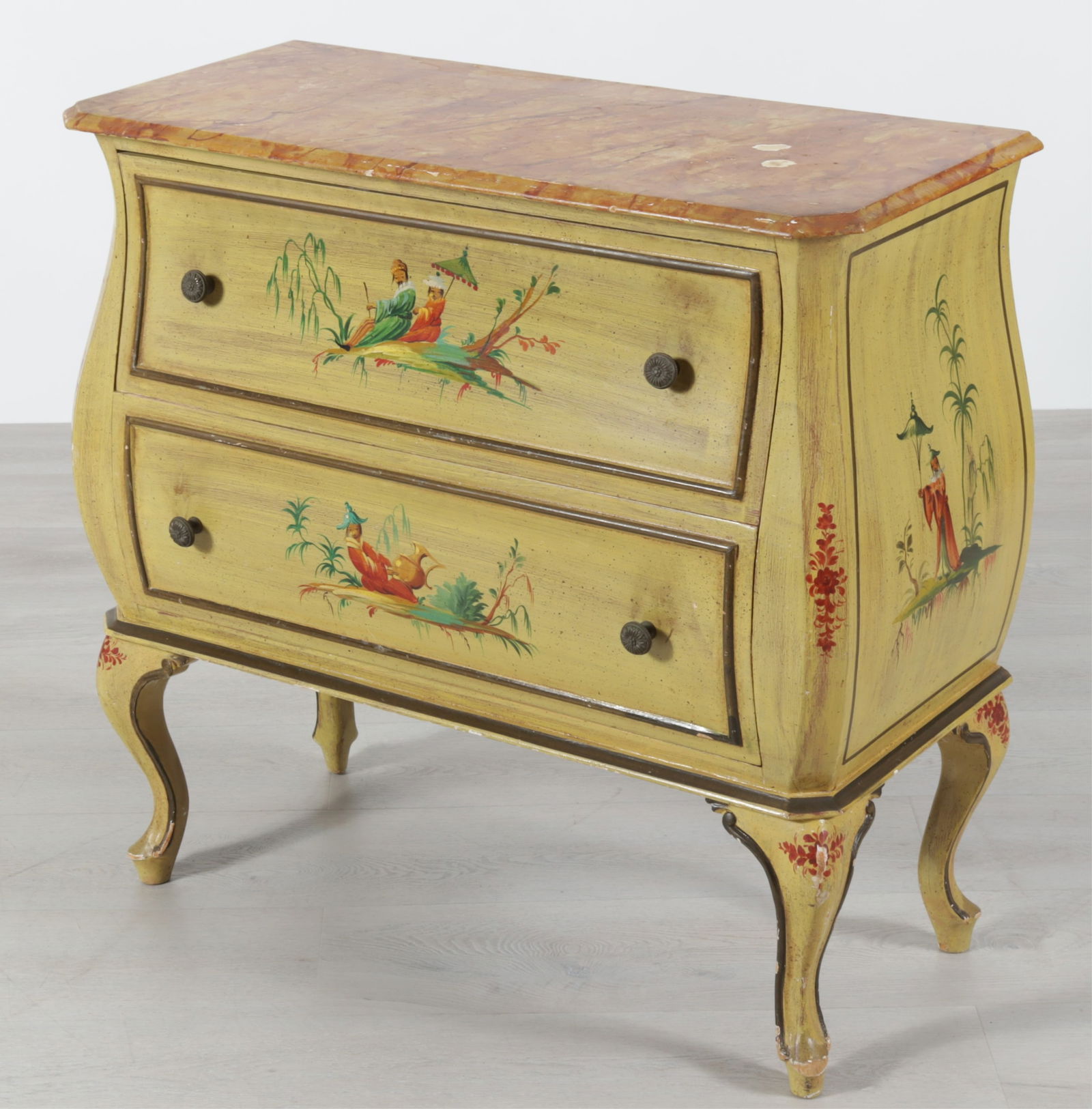 Italian Rococo Style Polychromed Commode: Italian Rococo Style Polychromed Commode, mustard-yellow ground with Asian figures in landscapes, with faux marble top, cabriole legs, stamped Made in Italy. Dimensions: 31.25" H x 33" W x 14.75" D 