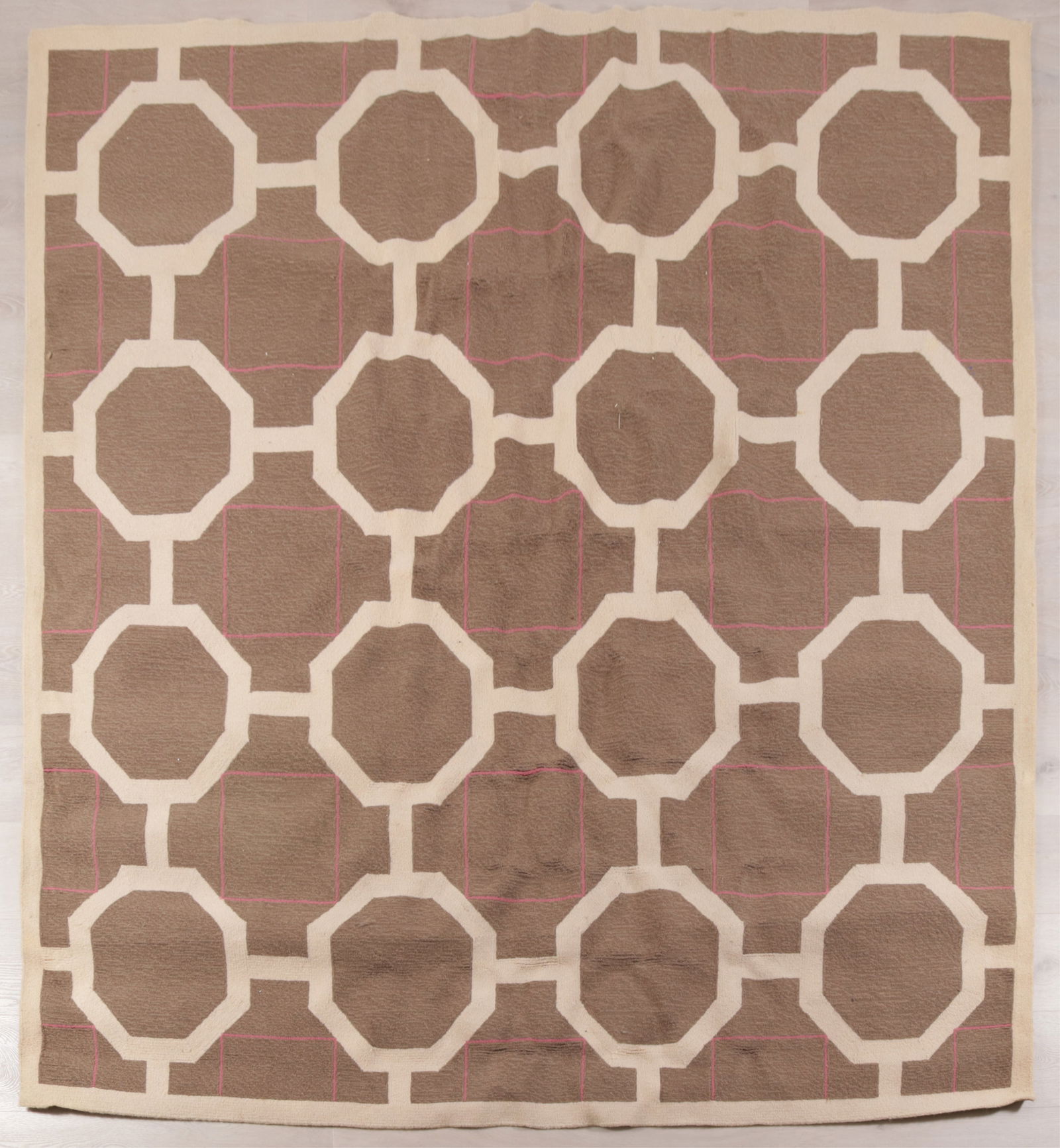 Lacey Champion for Albrizzi Wool Carpet 8 x 8: Lacey Champion for Albrizzi Design wool loop pile carpet, brown stripe field with geometric cream octagonal repeats, pink stripe Dimensions: 8' x 8' Property of a New York Architect and Designer
