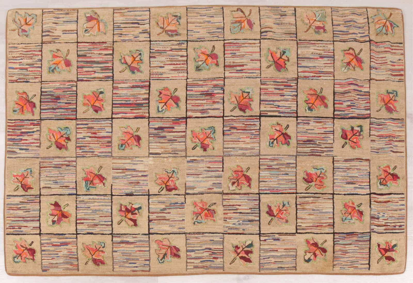 Fall Foliage Cotton Hook Rug 4-8 X 7-4: Fall Foliage patterned cotton American hook rug, multicolored with tan and burnt orange colors, squares of patchwork Dimensions: 4-8 X 7-4 