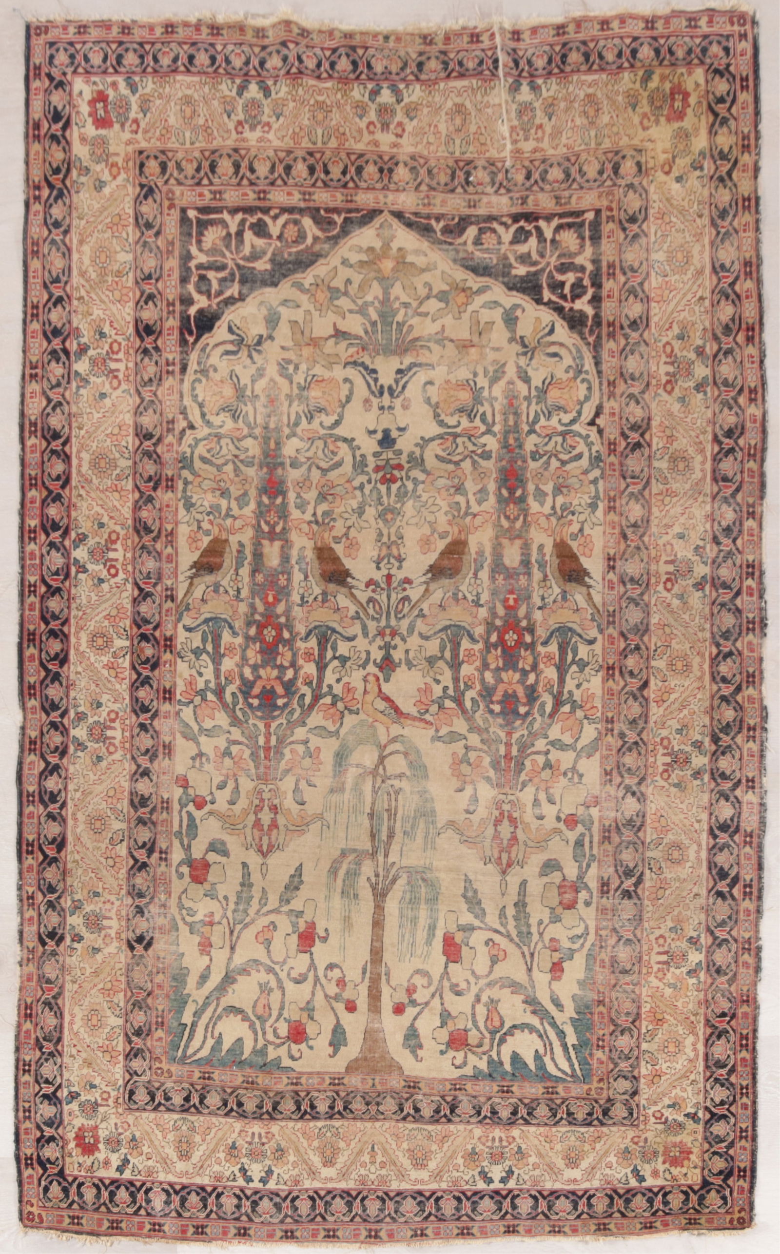 Persian Kirman Cypress Rug 4-8 X 6-8: Persian Kirman wool rug, Southeast Persia, Late 19th - E 20th C., asymmetrical field with tan ground mirrored pattern with cypress trees, floral arabesques and birds, border with 5 bands with blue