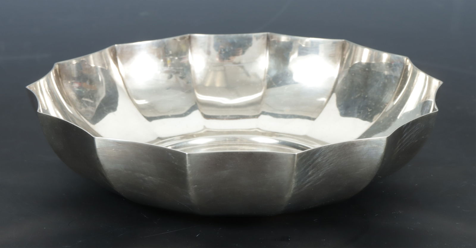 Tiffany & Co. Sterling Silver Fluted Bowl: Tiffany & Co. Sterling Silver Fluted Bowl, circa 1960s. Bottom marked Tiffany & Co / Makers / Sterling Silver / 23570. 10.04 OZT. Dimensions: 7.5" diameter 
