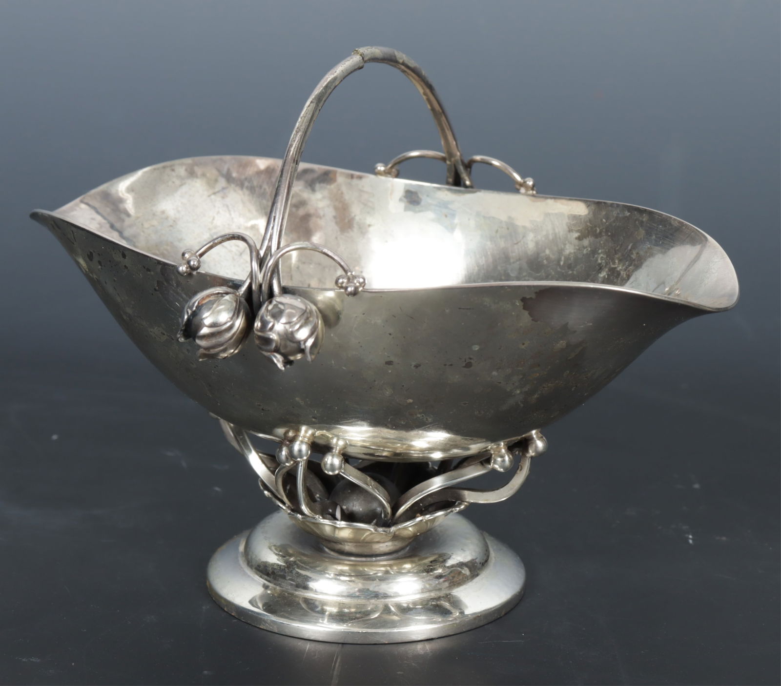 Georg Jensen Sterling Silver Sugar Bowl: Vintage Georg Jensen sterling silver ornamental pedestal sugar bowl with handle. Pattern number 235B, post 1945 maker's mark. 6.30 OZT. Dimensions: 4" H x 5.25" W 
