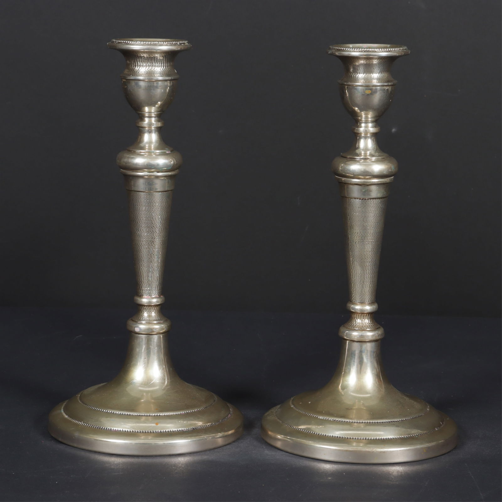 G. Ruggeri Pair of Silver Candlesticks: G. Ruggeri, Italy, pair of .800 silver candlesticks. Stamped 800 with 498FI maker's registration mark. Ruggeri F.lli & Gazzeri.11.70 OZT. Dimensions: 5" W at base X 9.5"H 