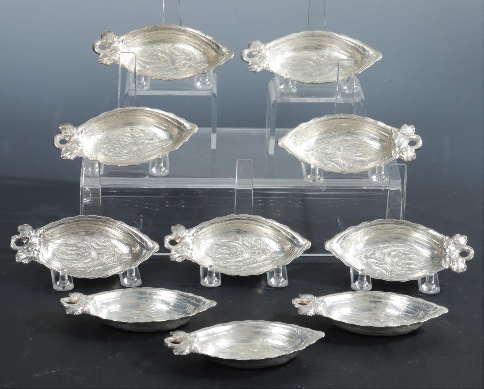 10 Gorham 'Iris' Sterling Silver Nut Dishes: A group of 10 antique Gorham/Durgin sterling silver iris form nut dishes, pattern 104A. Bottoms marked Gorham Sterling with Durgin script D maker's mark. 9.39 OZT. Dimensions: 4.5" L x 2.25" W