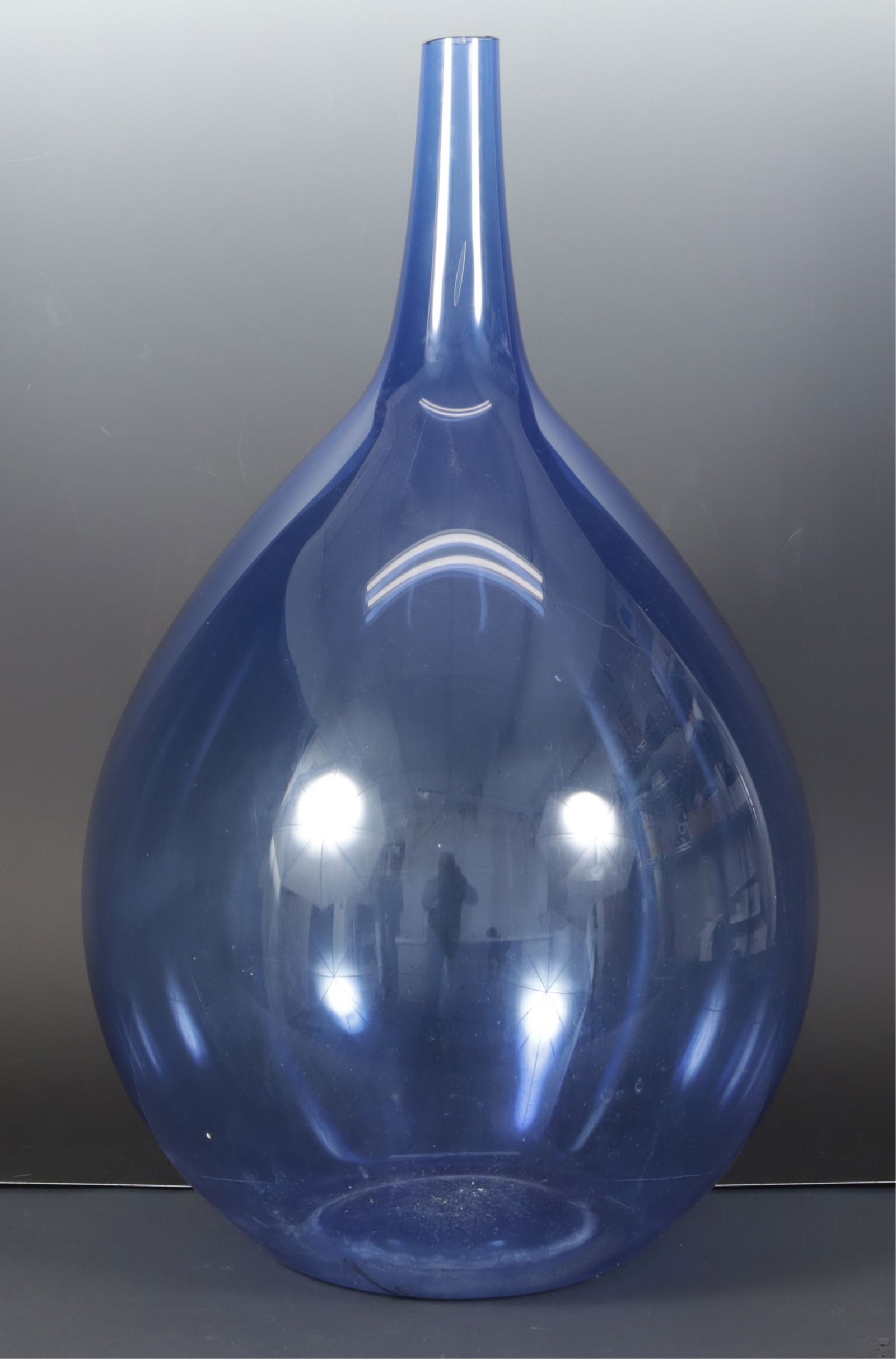 Large MCM Cobalt Blue Glass Vessel: Large Midcentury Modern cobalt blue glass vessel, with uneven lip, apparently unsigned. Dimensions: Approximately 25 1/2" H x 15" Dia