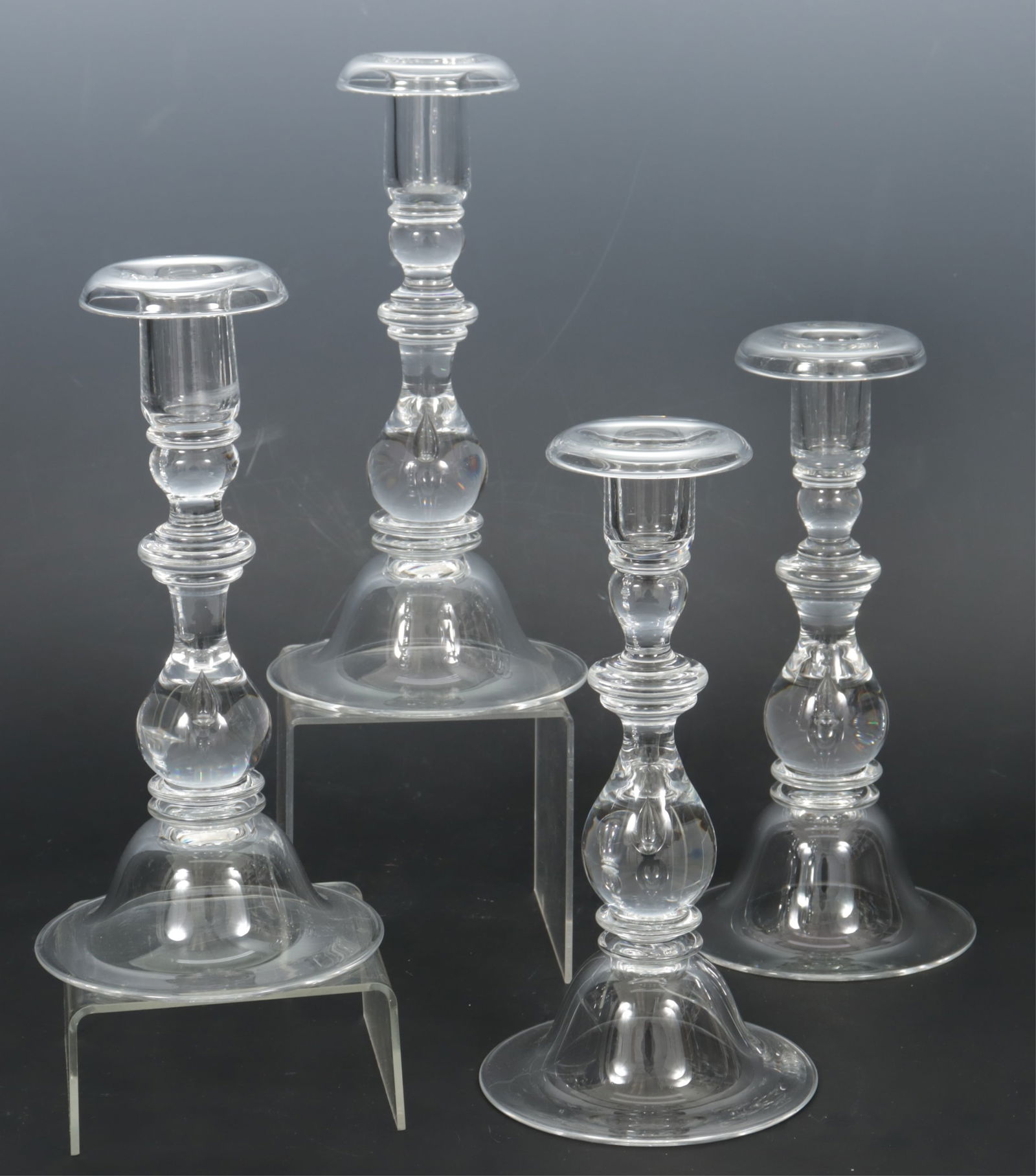 Four Steuben Glass Teardrop Candlesticks: Set of Four Steuben Glass Teardrop Candlesticks Dimensions: 9" H