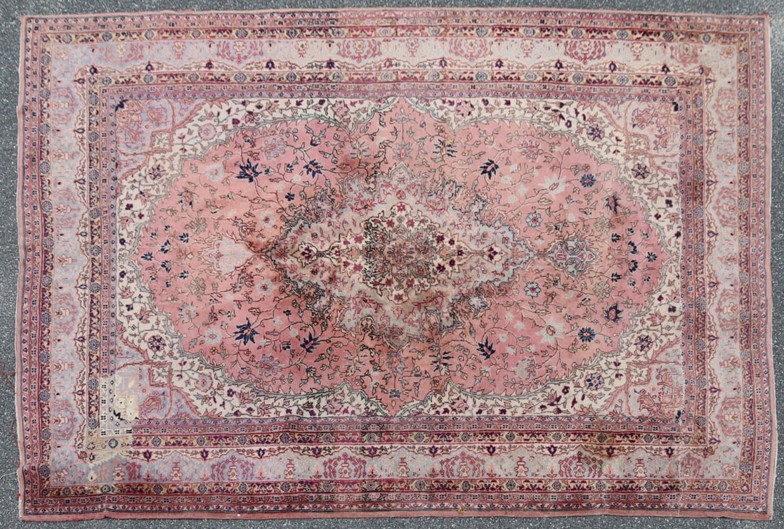 Hand-Knotted Kerman Rug: Hand-knotted wool pile on a cotton foundation. Featuring a prominent, intricately detailed central floral medallion against a field of scrolling vines, palmettes, and foliate motifs. Woven in a muted,