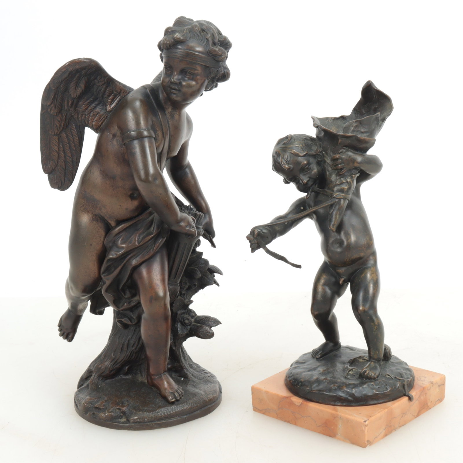 Two French Bronze Sculptures, 19th C: Two French Bronze Sculptures, 19th C, including a cherub and a smaller figure with bouquet mounted on marble base. Dimensions: 11" H and 8.75" H. 18 lbs.