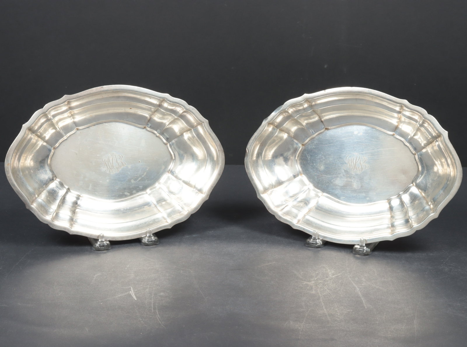Pair of Gorham Sterling Silver Serving Dishes: A pair of Gorham sterling silver Chippendale pattern serving dishes, pattern 42671. 27 OZT. Dimensions: 10" x 7 1/8"