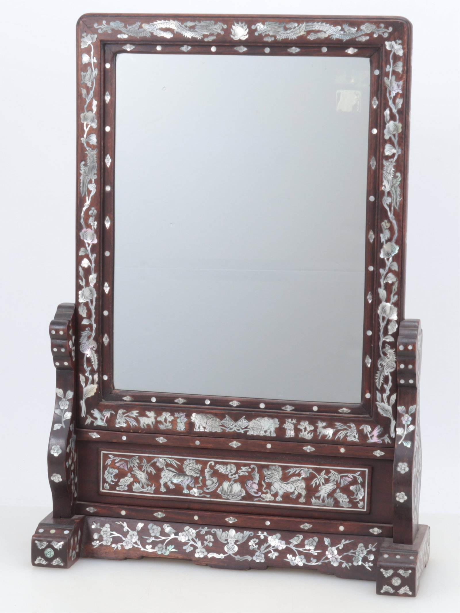 Chinese MOP Inlaid Hardwood Dressing Mirror: Chinese Mother of Pearl Inlaid Hardwood Dressing Mirror, Early 20th C. Dimensions: 24.75" H x 16.5" W Property from a Mount Vernon, NY estate.