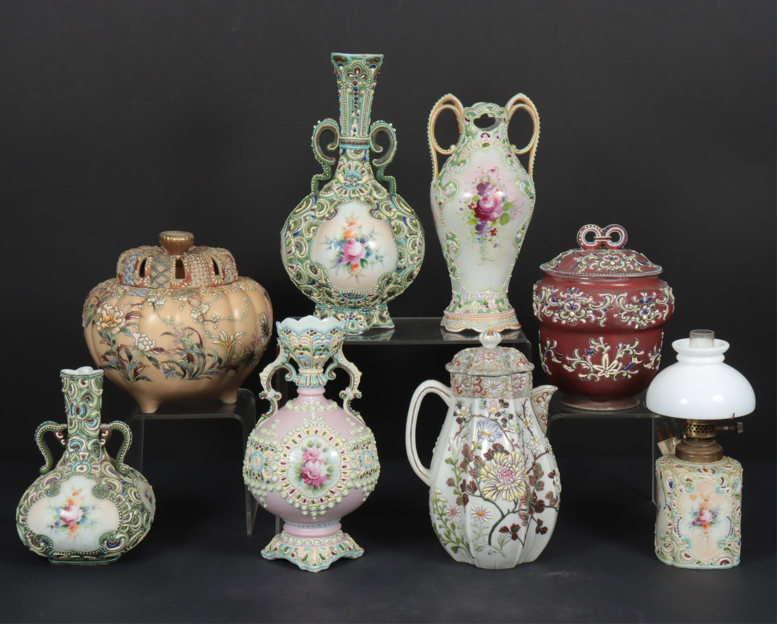 8 Moriage Satsuma Table Articles: Group of 8 Moriage Satsuma Table Articles, including vases, potpourri, lamp, teapot and covered jar Dimensions: Largest 11.25" H Property from a Mount Vernon, NY estate.