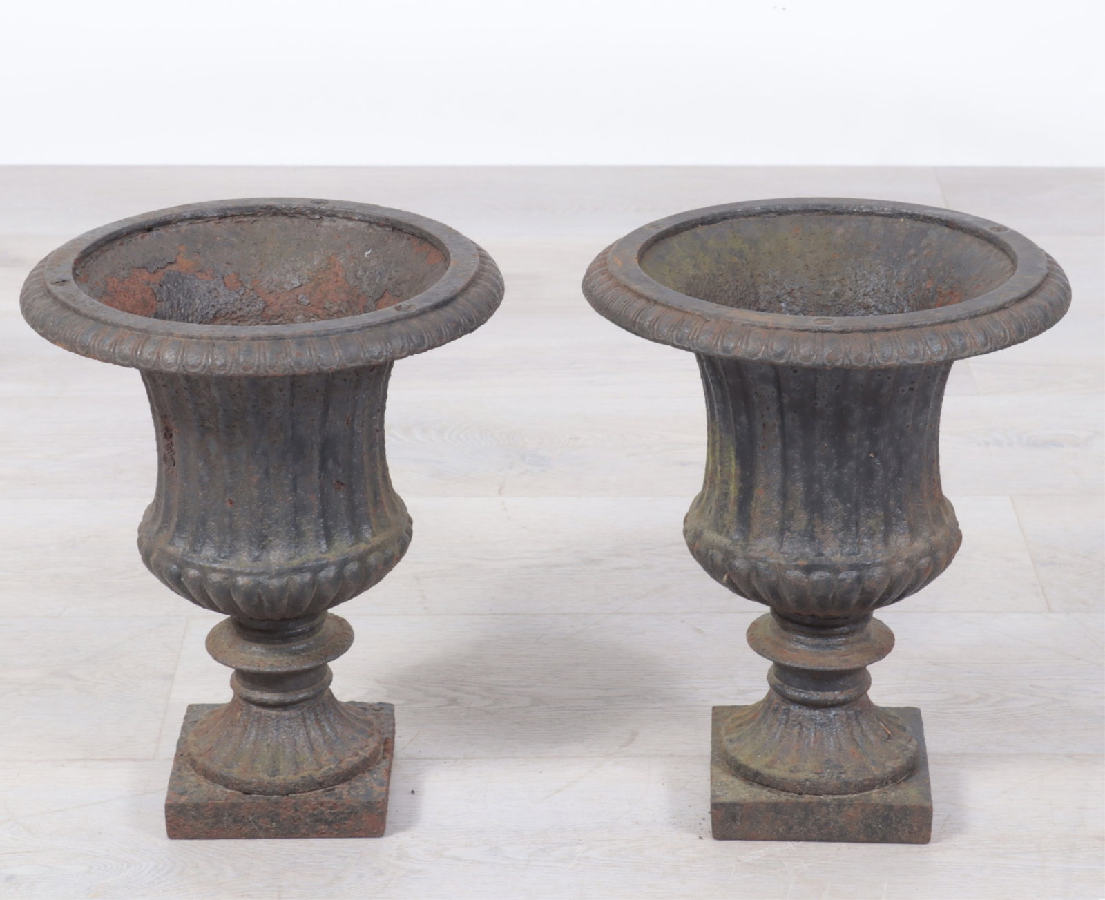 Pair Classical Style Cast Iron Campana Form Urns: Pair Classical Style Cast Iron Campana Form Urns Dimensions: 14" H x 11.5" Dia.