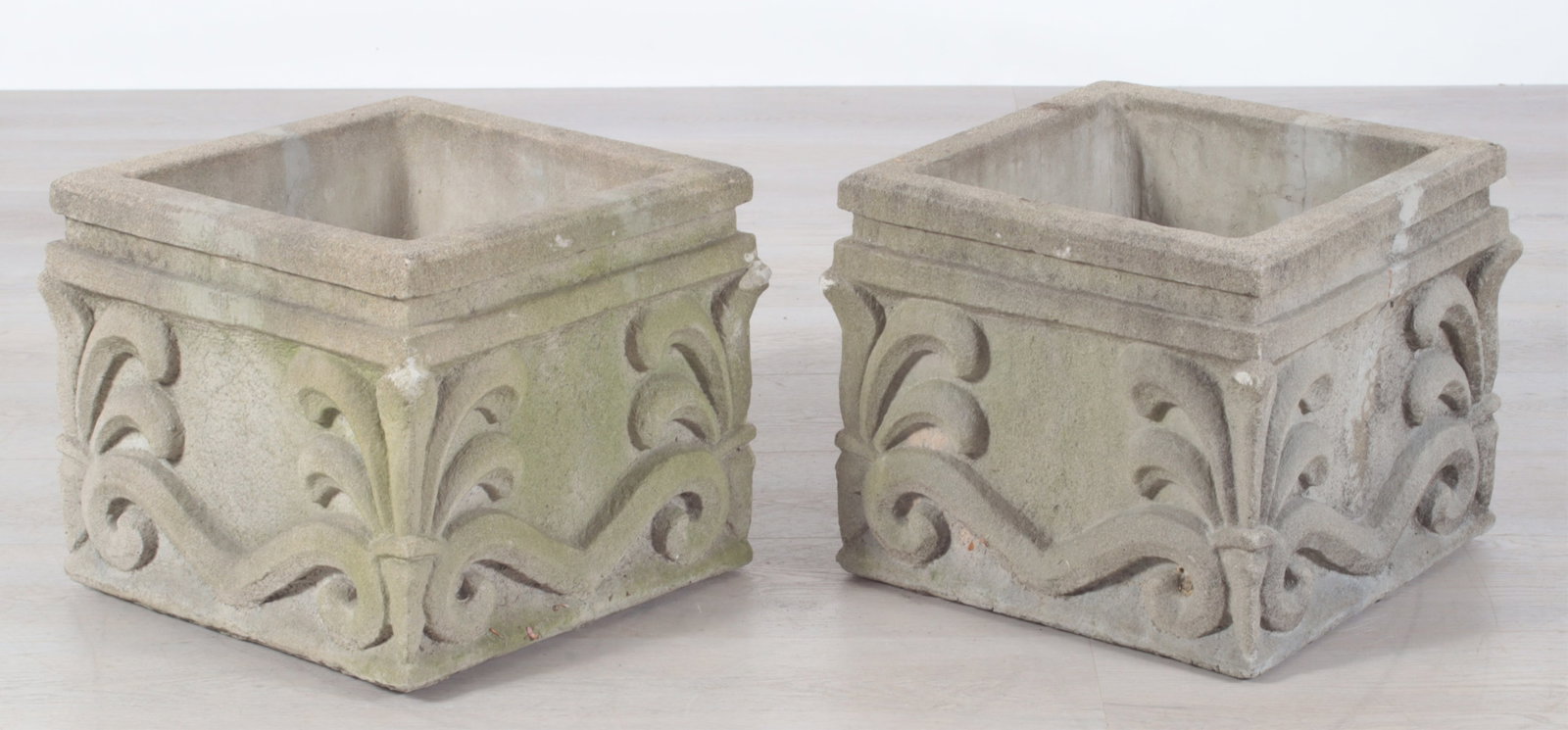 Pair Regency Style Anthemion Planters: A pair of Regency style Anthemion cast cement planters, stamped in casting: #13 99 SAW. Dimensions: 13.75" H x 15.5" square.