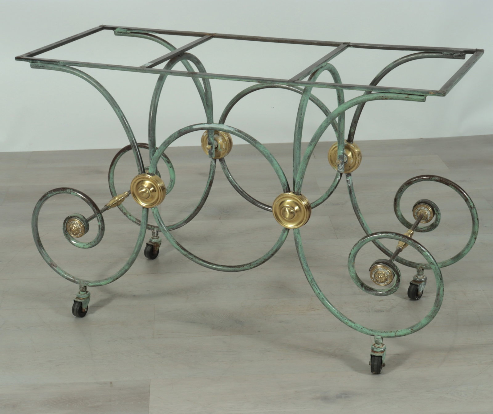 French Painted Iron & Brass Baker's Table: French Painted Iron & Brass Baker's Table, on casters. Dimensions: 29.75" H x 46.25" W x 18.5" D Property from a Bronxville Estate.